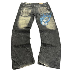 TWC Vintage Jeans aus schwarzem Denim mit japanischer Totenkopf-Stickerei und verwaschenem Crinkle-Effekt