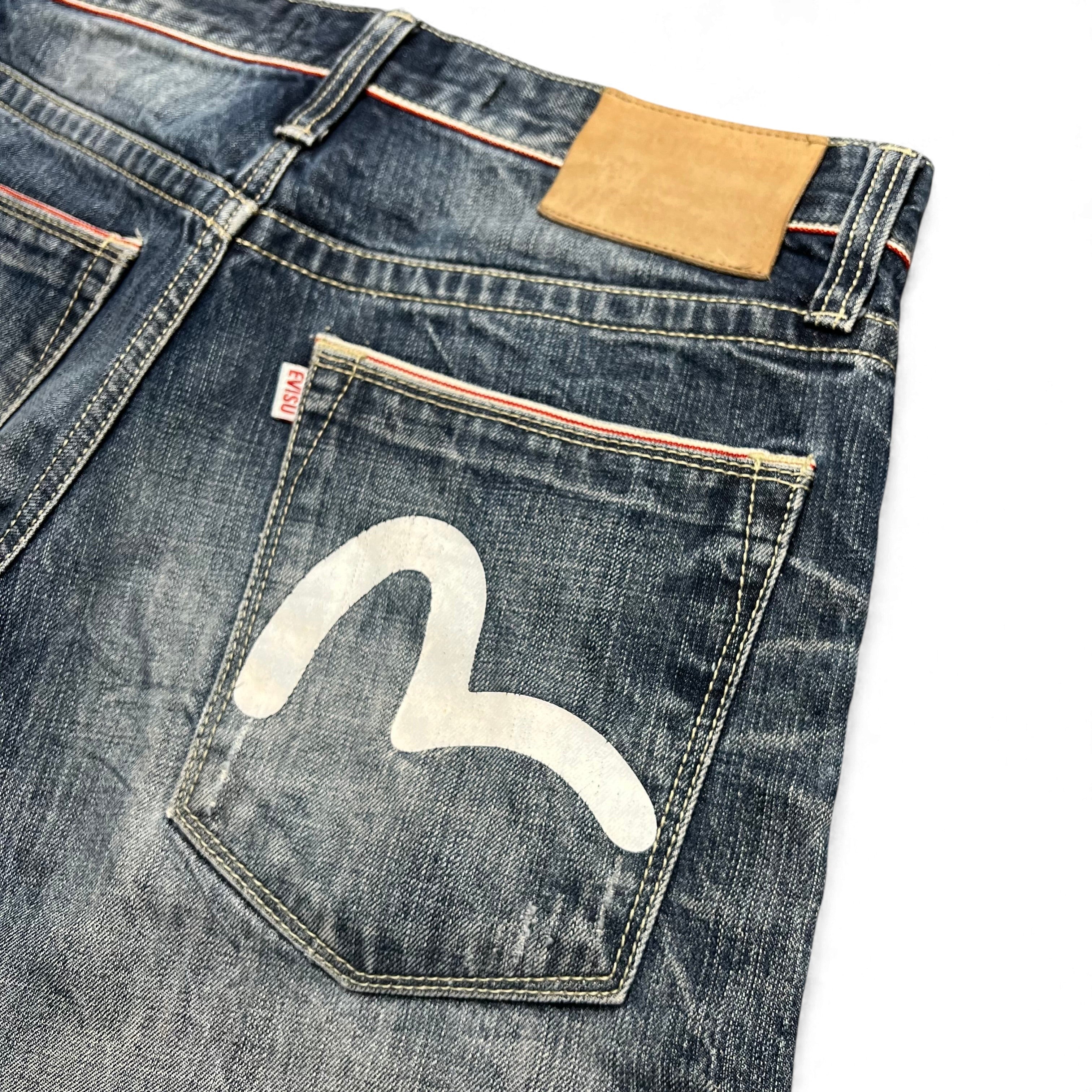 TWC Vintage Evisu KC Straight Jeans in verwaschenem Blau mit ikonischem weißem Möwen-Logo auf der Gesäßtasche
