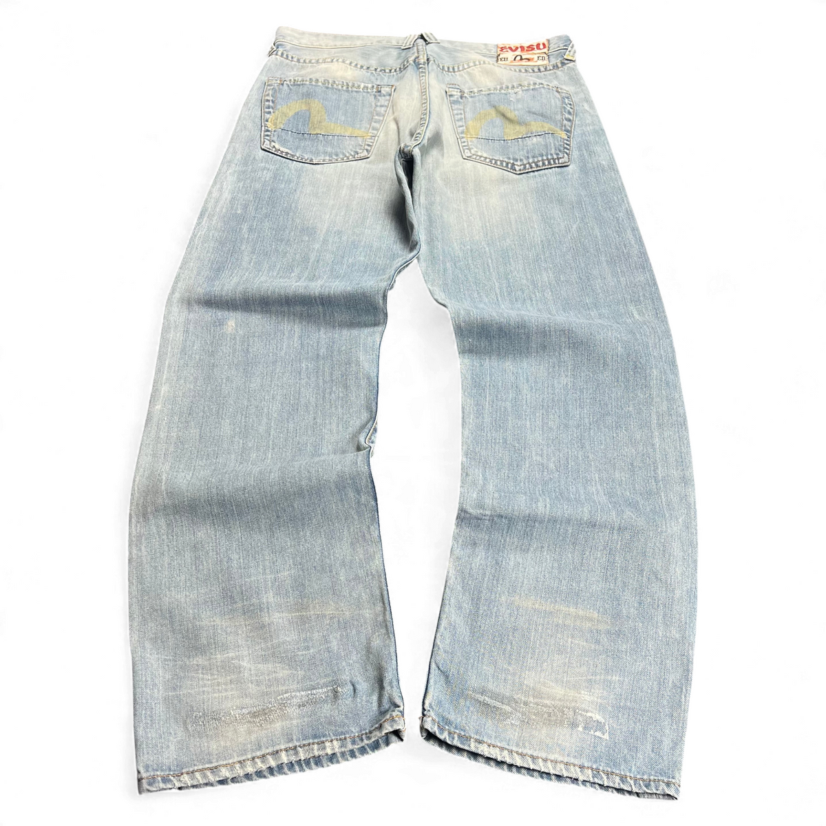 TWC Vintage Evisu Jeans in hellblauem Denim mit Distressed-Optik und charakteristischem Seagull-Print auf den Taschen