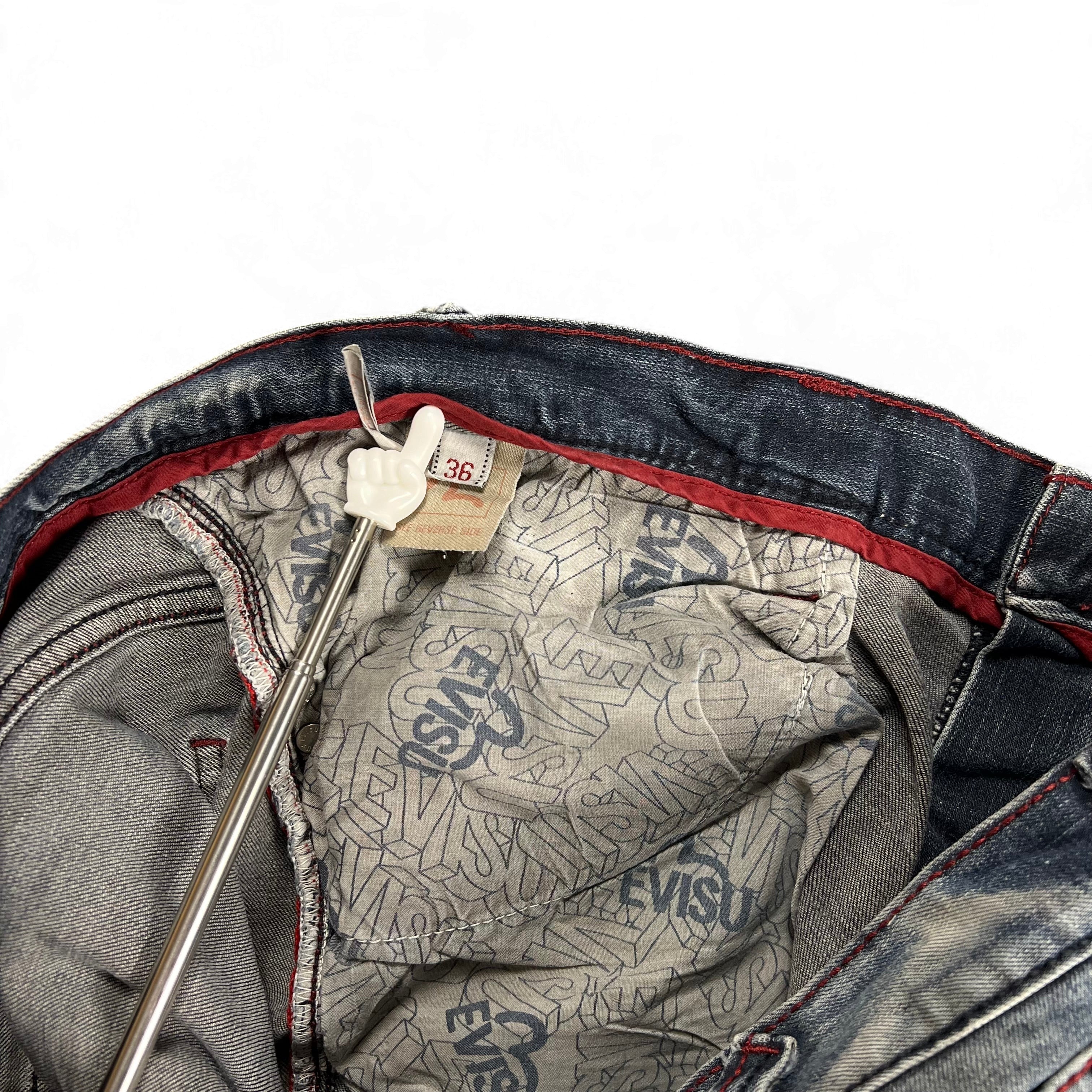 TWC Vintage Evisu KC Straight Jeans mit Logo-Innenfutter und rotem Bund-Detail