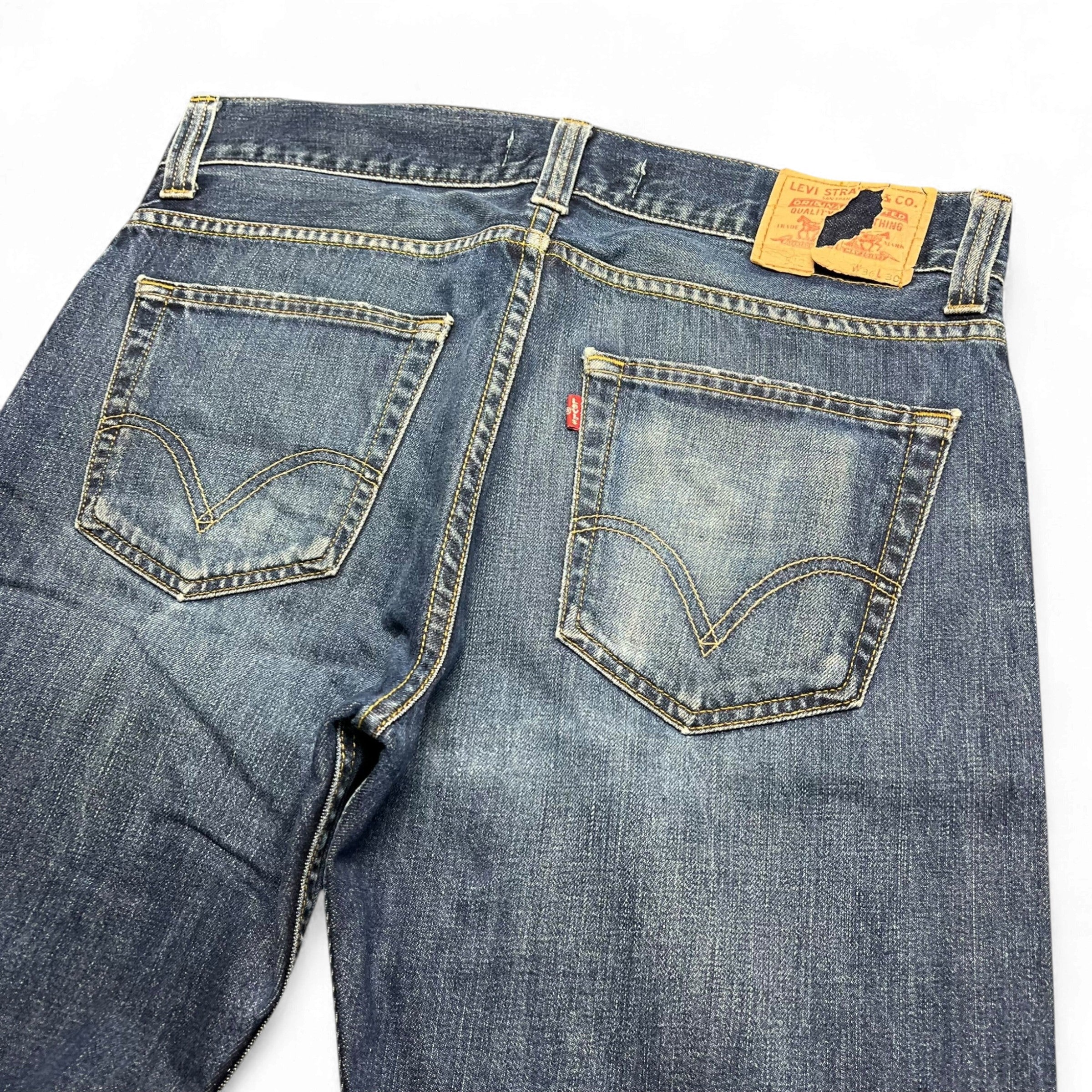 TWC Vintage Levi’s 512 Bootcut Jeans in blauem Denim mit klassischem Lederpatch und Gesäßtaschen