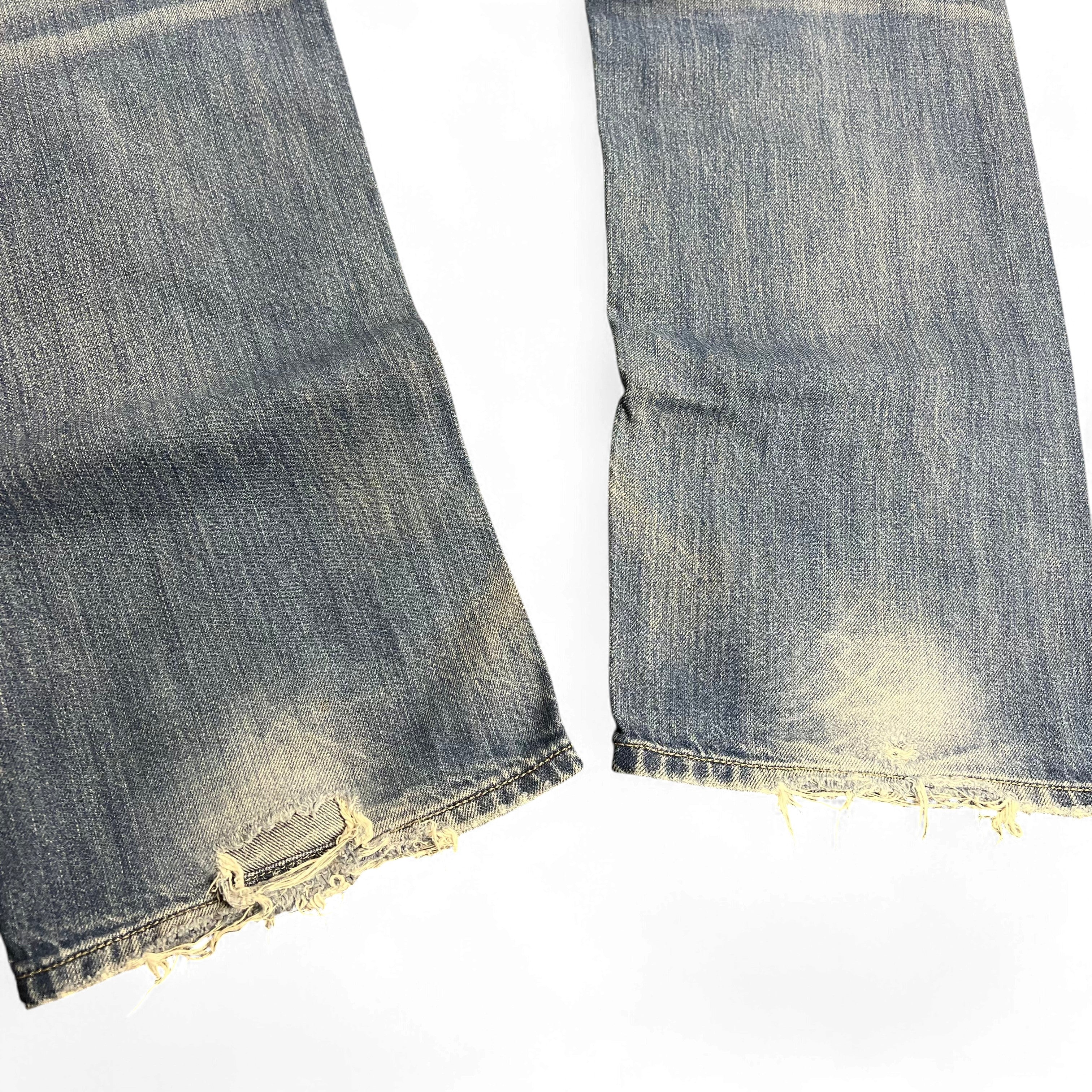 TWC Vintage Diesel Larkee Straight Jeans in verwaschenem Blau mit ausgefransten Beinabschlüssen
