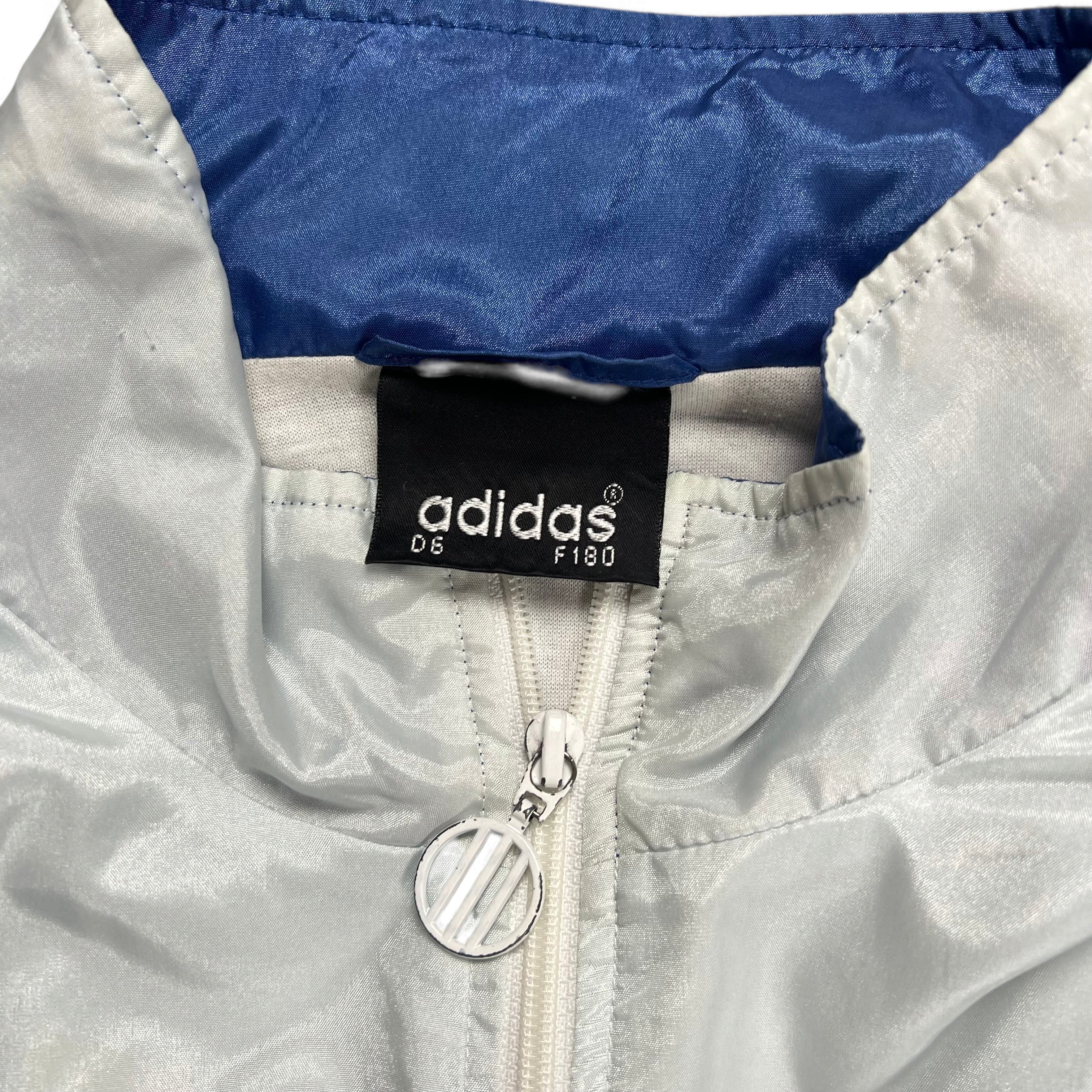 TWC Vintage Adidas 90er Jahre Windbreaker mit blau-weißem Kragen und Marken-Reißverschluss-Detail