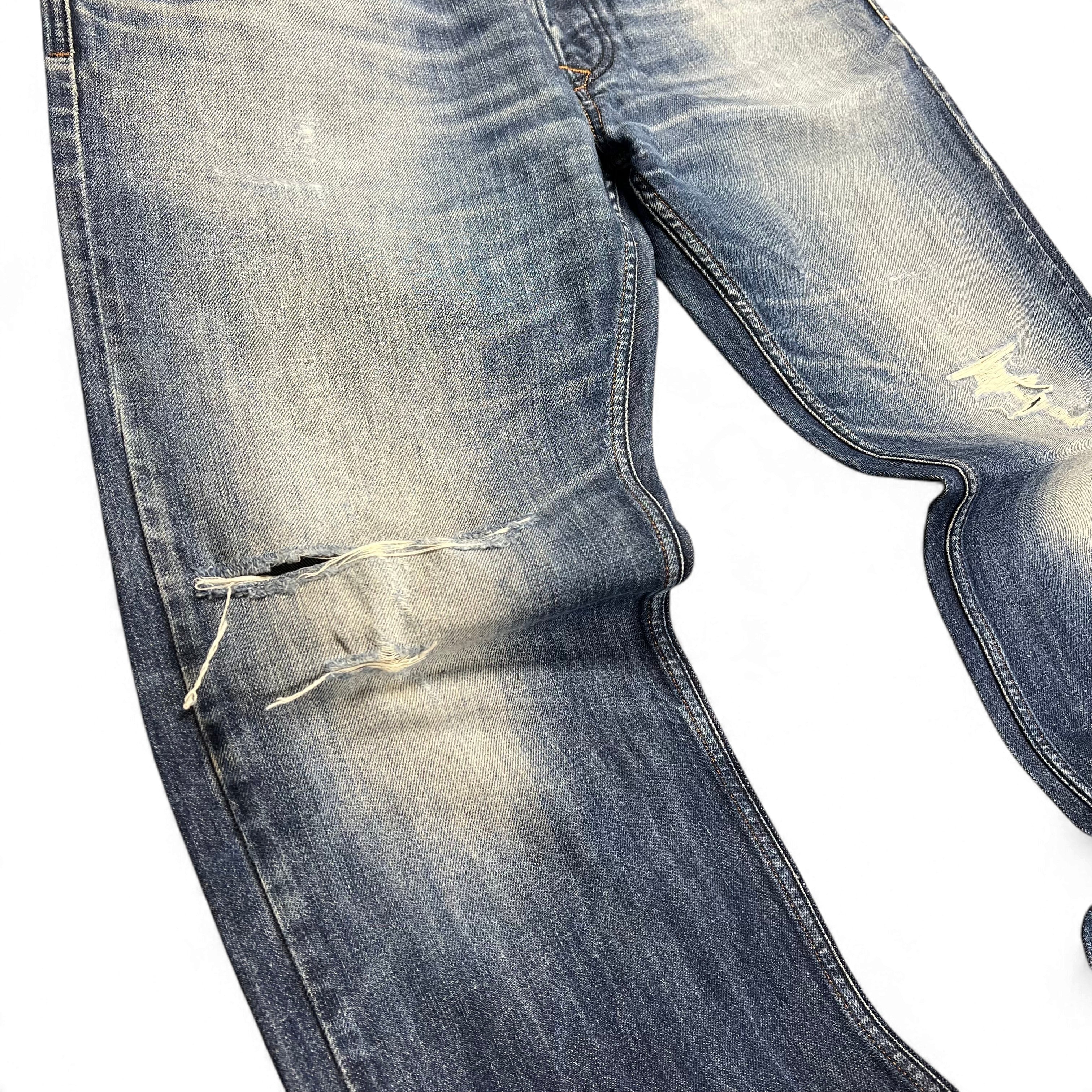 TWC Vintage Diesel Larkee Straight Jeans in blauem Denim mit Distressed-Details und Rissen am Knie