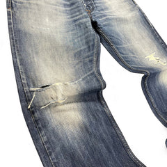 TWC Vintage Diesel Larkee Straight Jeans in blauem Denim mit Distressed-Details und Rissen am Knie