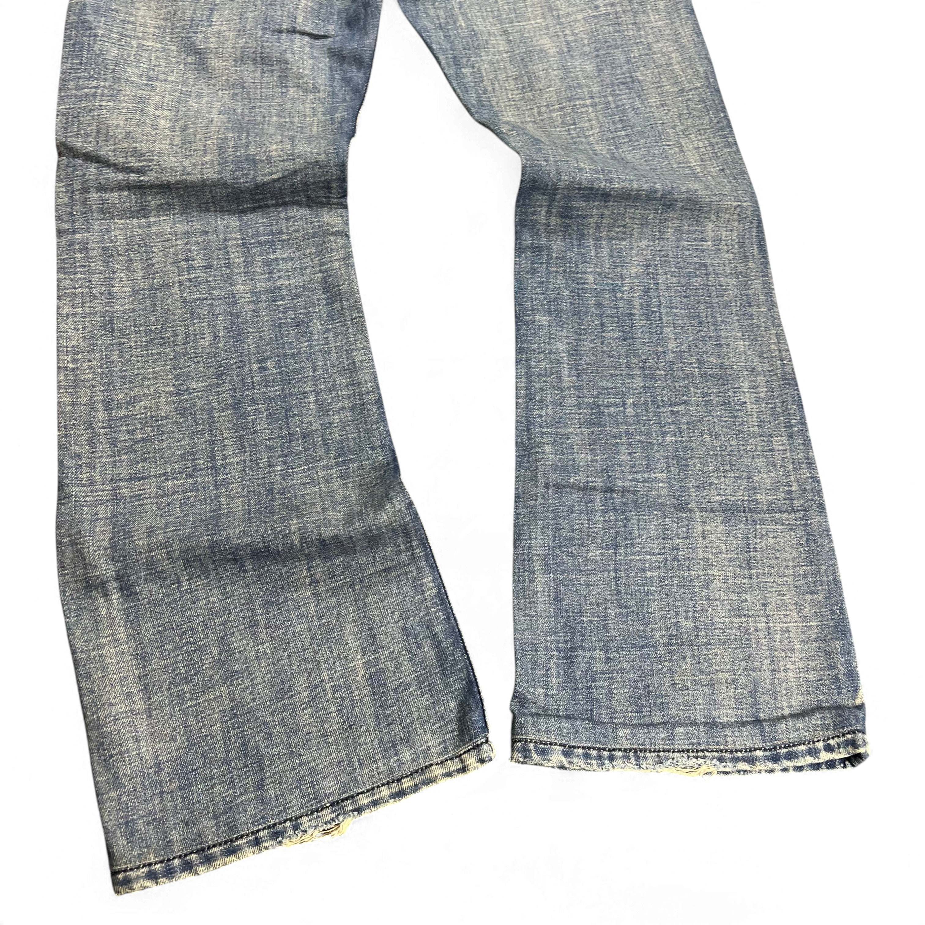 TWC Vintage Diesel Zathan Bootcut Jeans in verwaschenem Blau mit leichtem Distressed-Look an den Beinabschlüssen