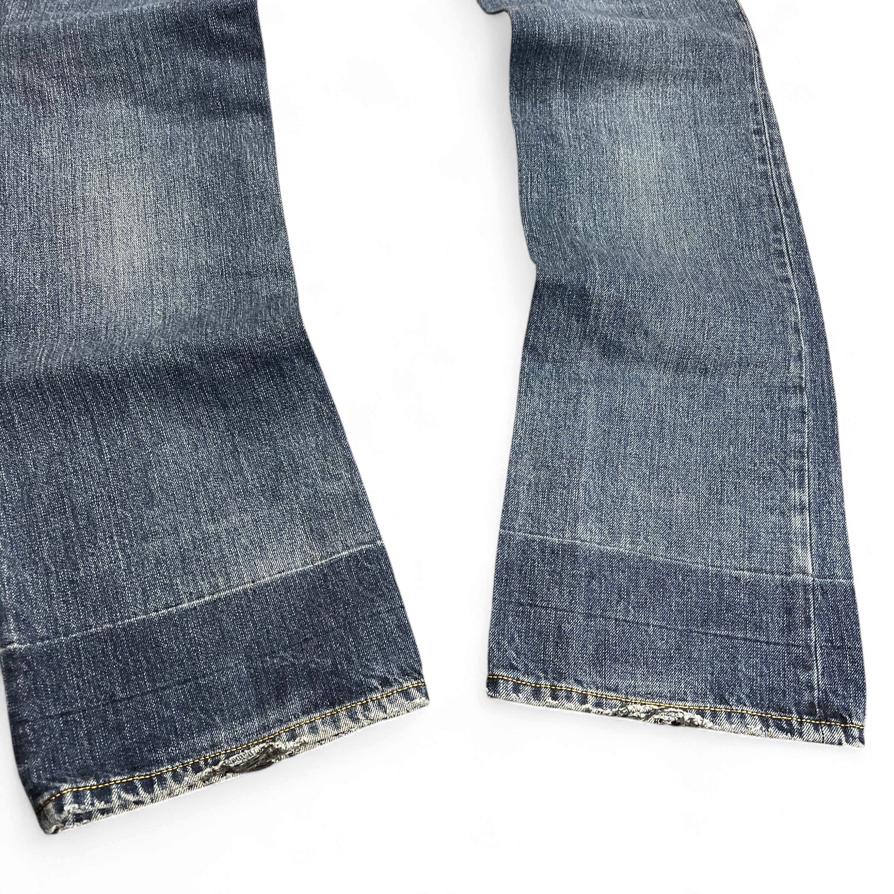 TWC Vintage Diesel Zatiny Bootcut Jeans in verwaschenem Blau mit abgenutzten Säumen