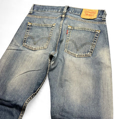 TWC Vintage Levi's 512 Bootcut Jeans in verwaschenem Blau mit klassischem Lederpatch und Gesäßtaschen
