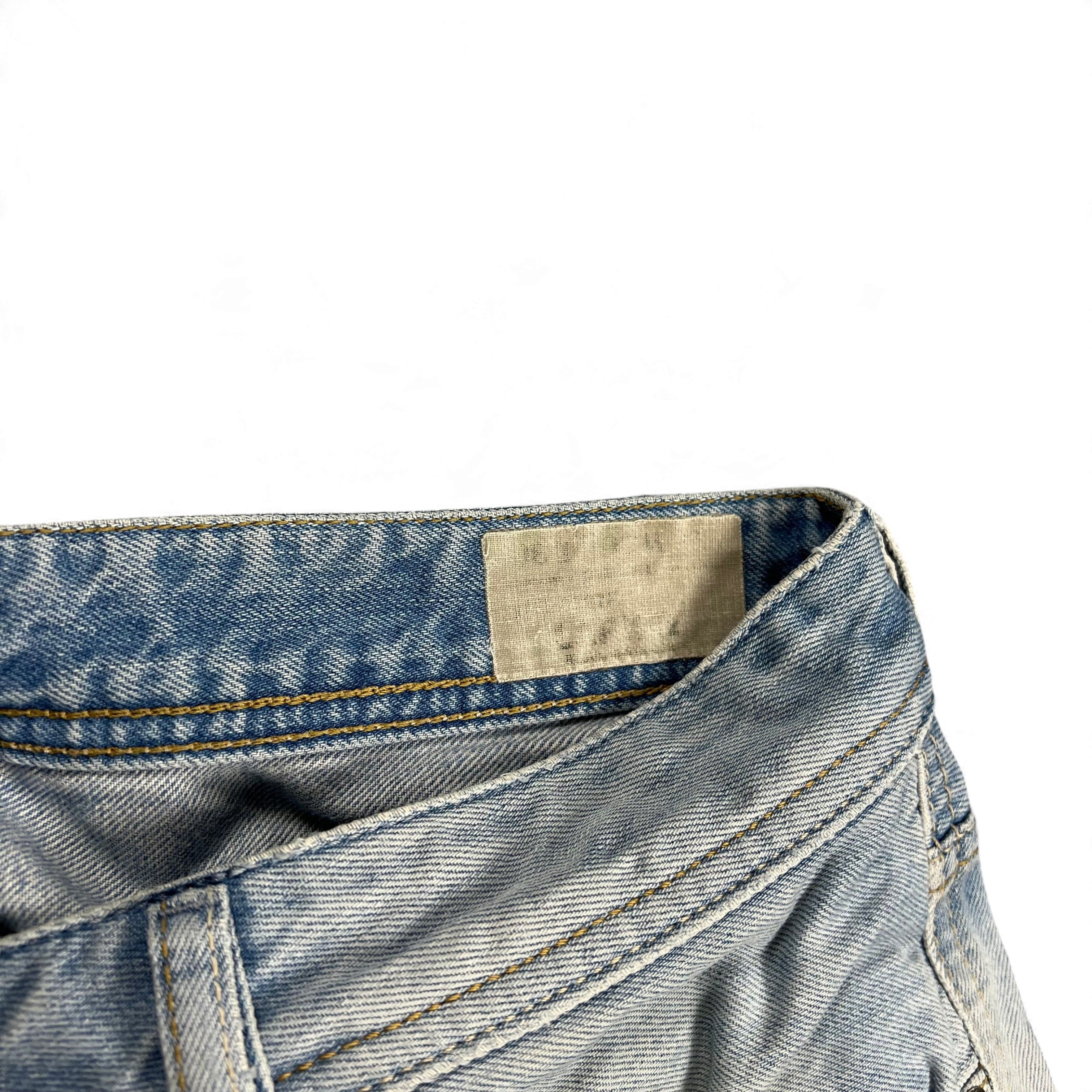 TWC Vintage Diesel Jeans mit heller Waschung und Leder-Label am Bund