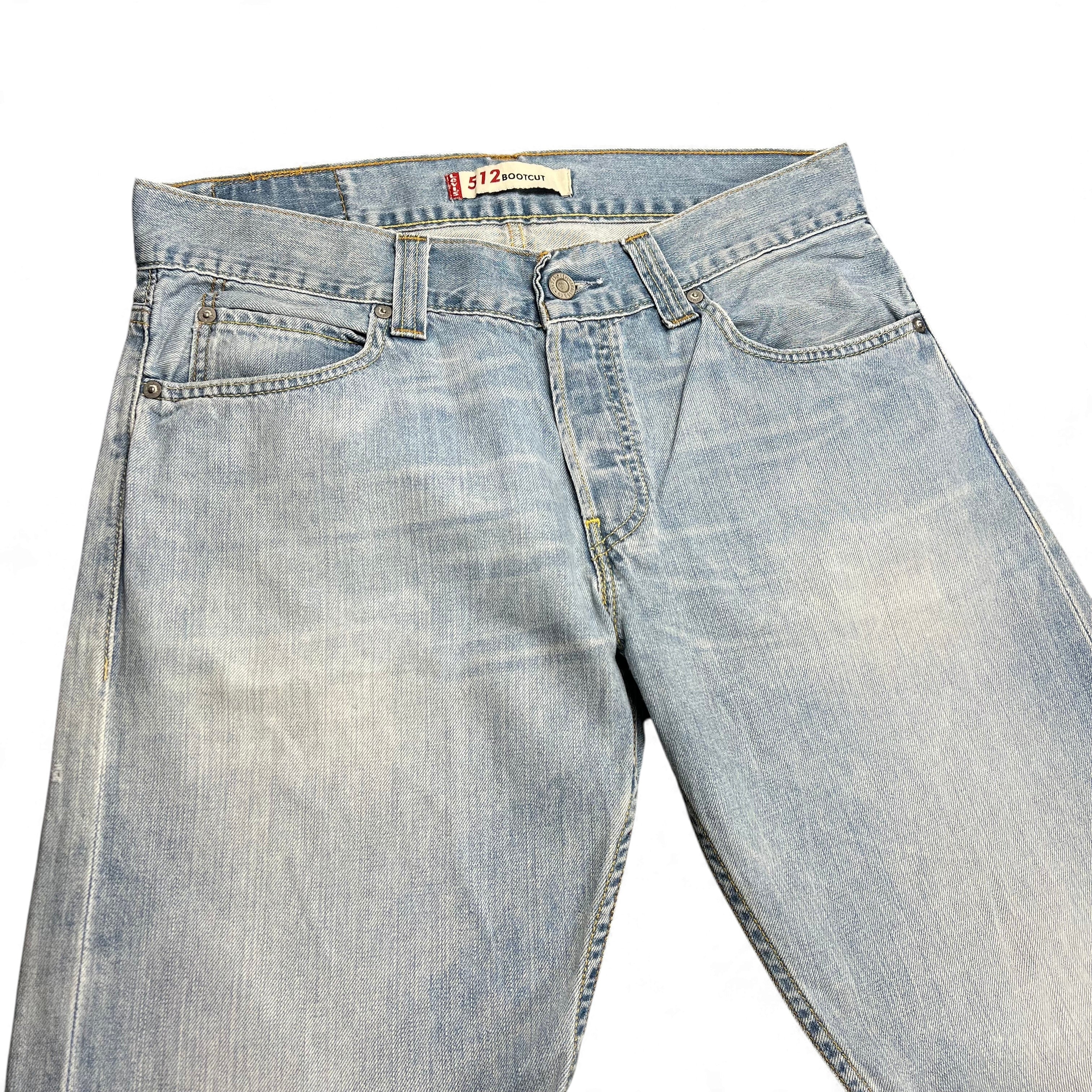TWC Vintage hellblaue 512 Bootcut Jeans mit klassischem Knopfverschluss und verwaschener Denim-Optik