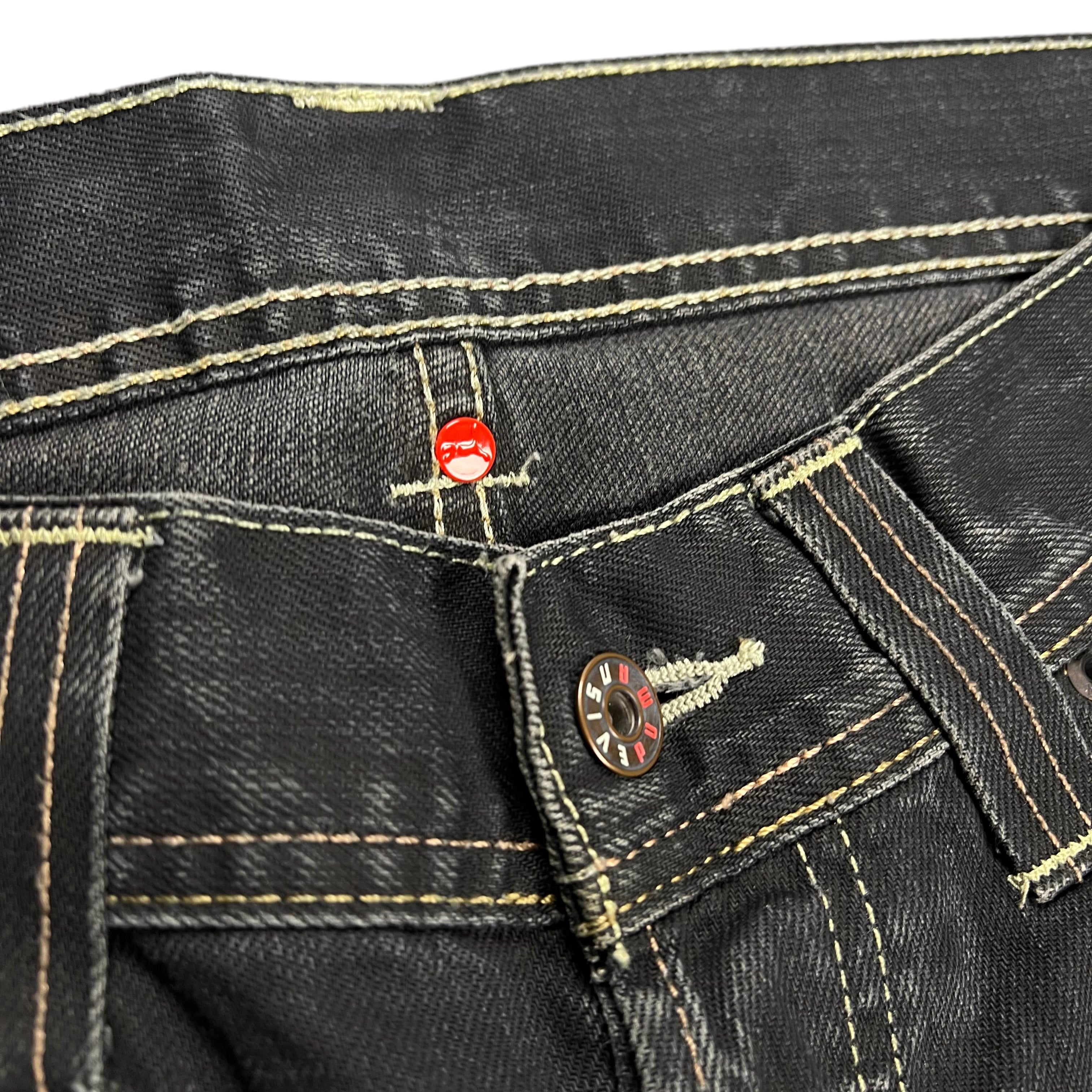 TWC Vintage Evisu x Puma Bootcut Jeans in Schwarz mit Kontrastnähten und rotem Detail am Bund