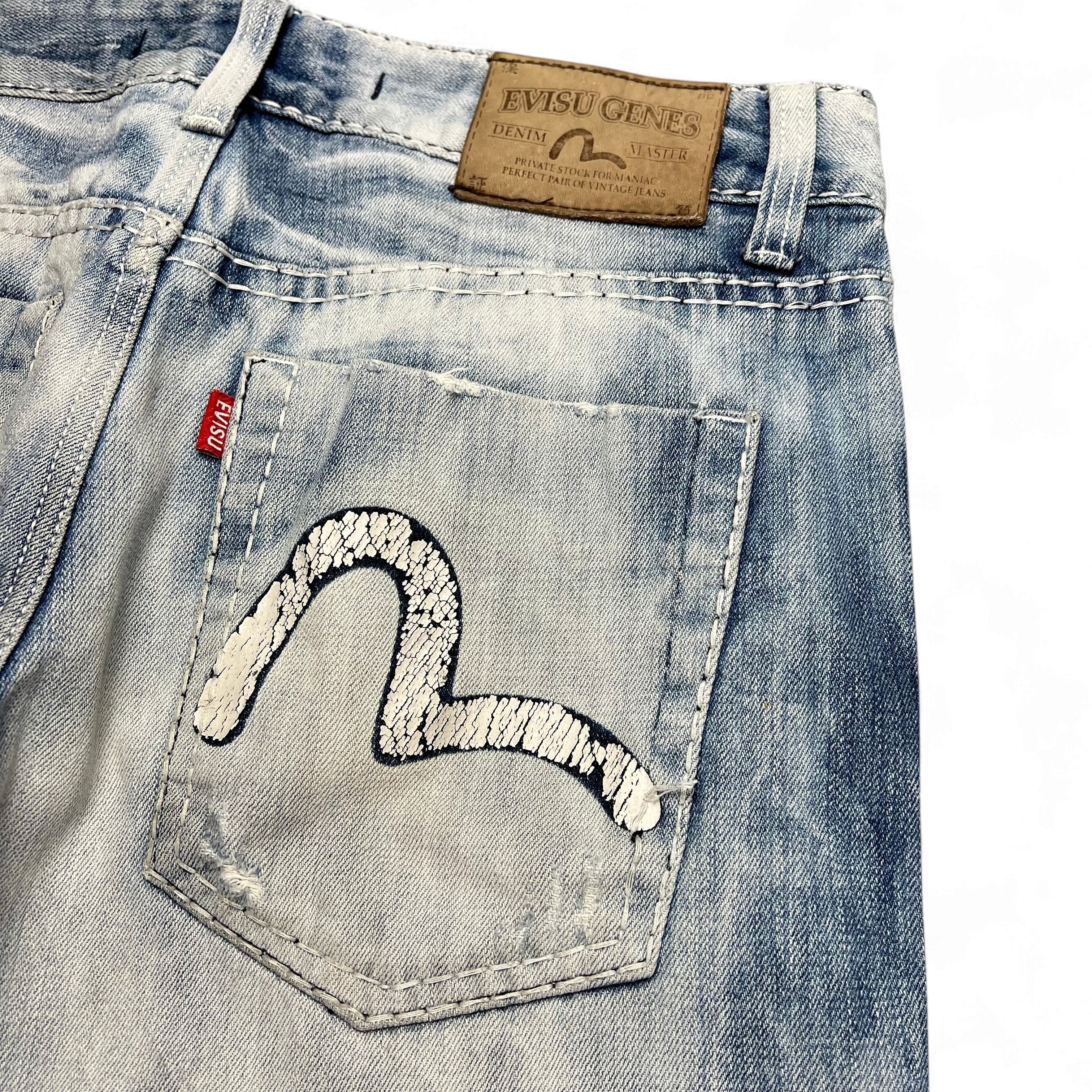 TWC Vintage Evisu KC Baggy Jeans in hellblauem Denim mit ikonischem weißem Möwen-Logo auf der Gesäßtasche