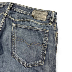 TWC Vintage Diesel New-Fanker Bootcut Jeans in blauem Denim mit Leder-Label und Gesäßtasche