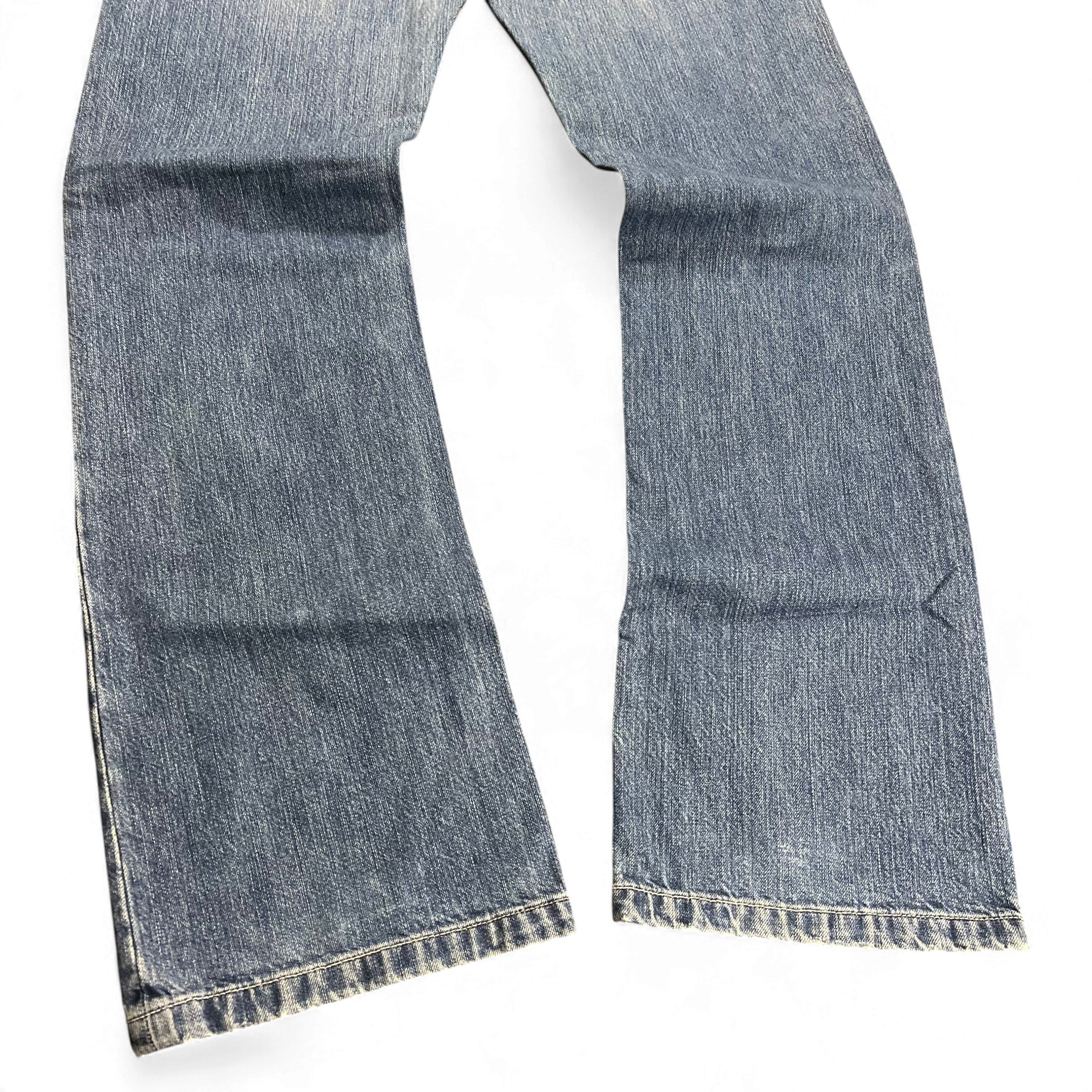 TWC Vintage Diesel Bootcut Jeans in verwaschenem Blau mit ausgestelltem Bein und Vintage-Waschung