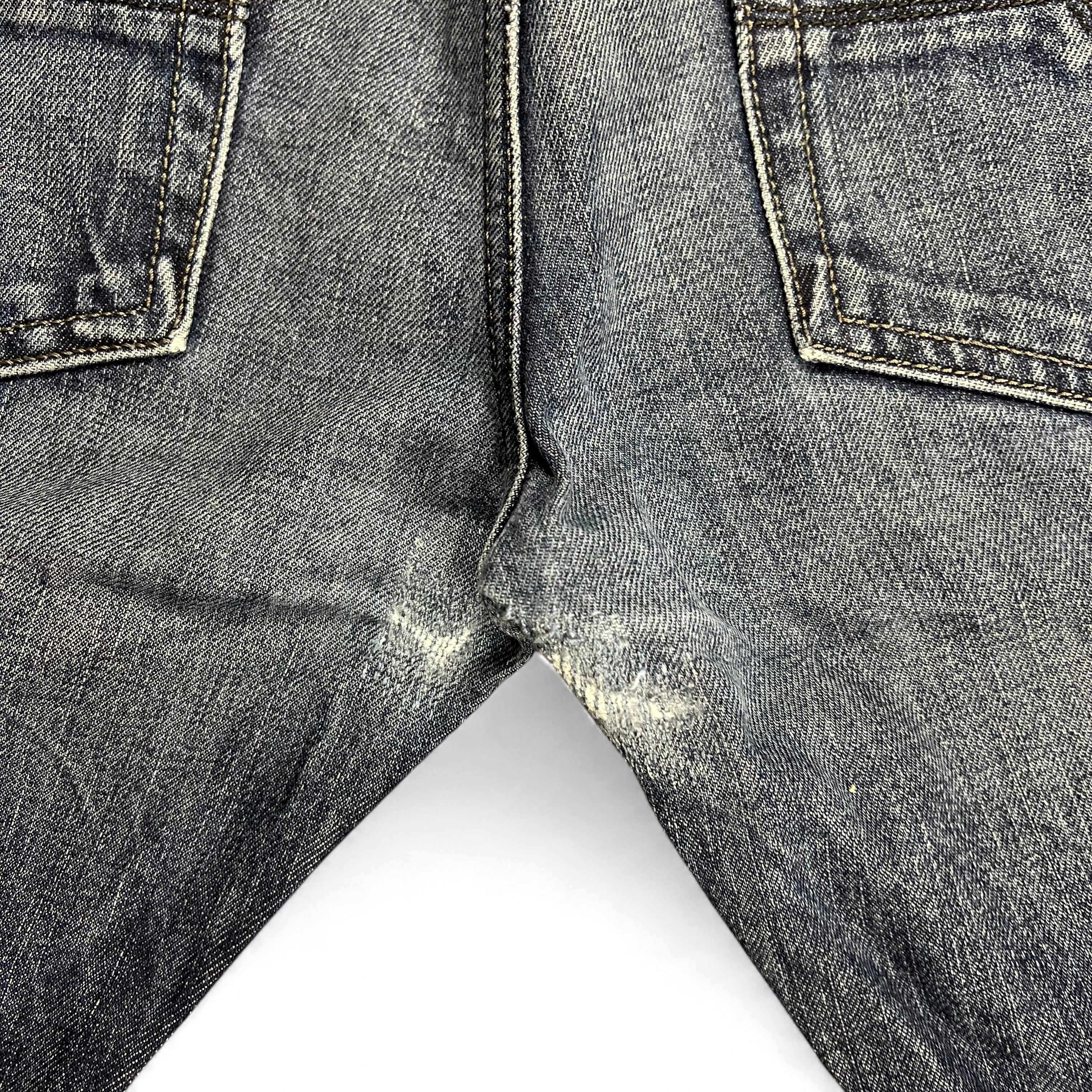 TWC Vintage Diesel Straight USA Jeans mit verwaschenem Denim-Look und Abnutzungsspuren im Schrittbereich