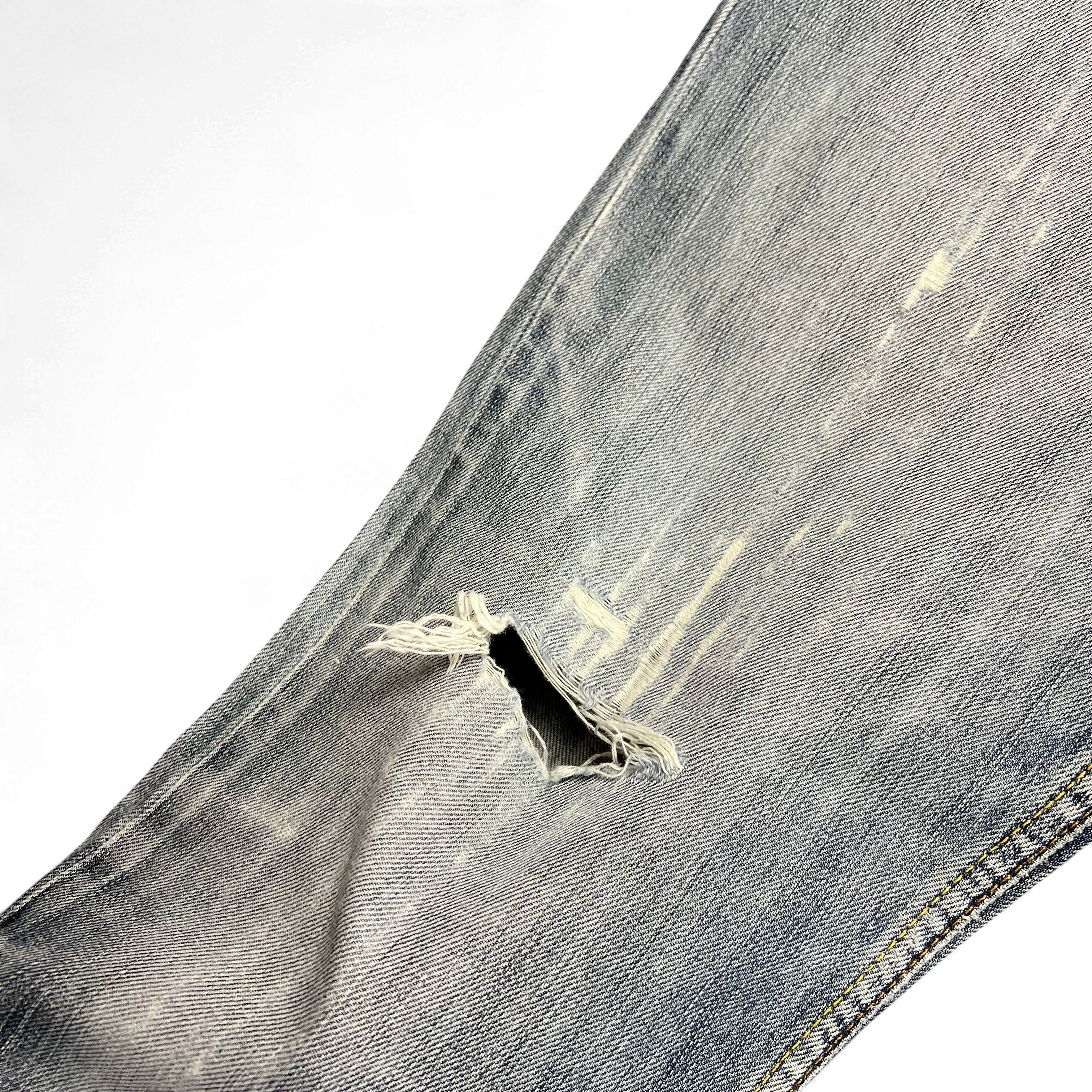 TWC Vintage Jeans mit heller Waschung und Distressed-Details in Used-Optik