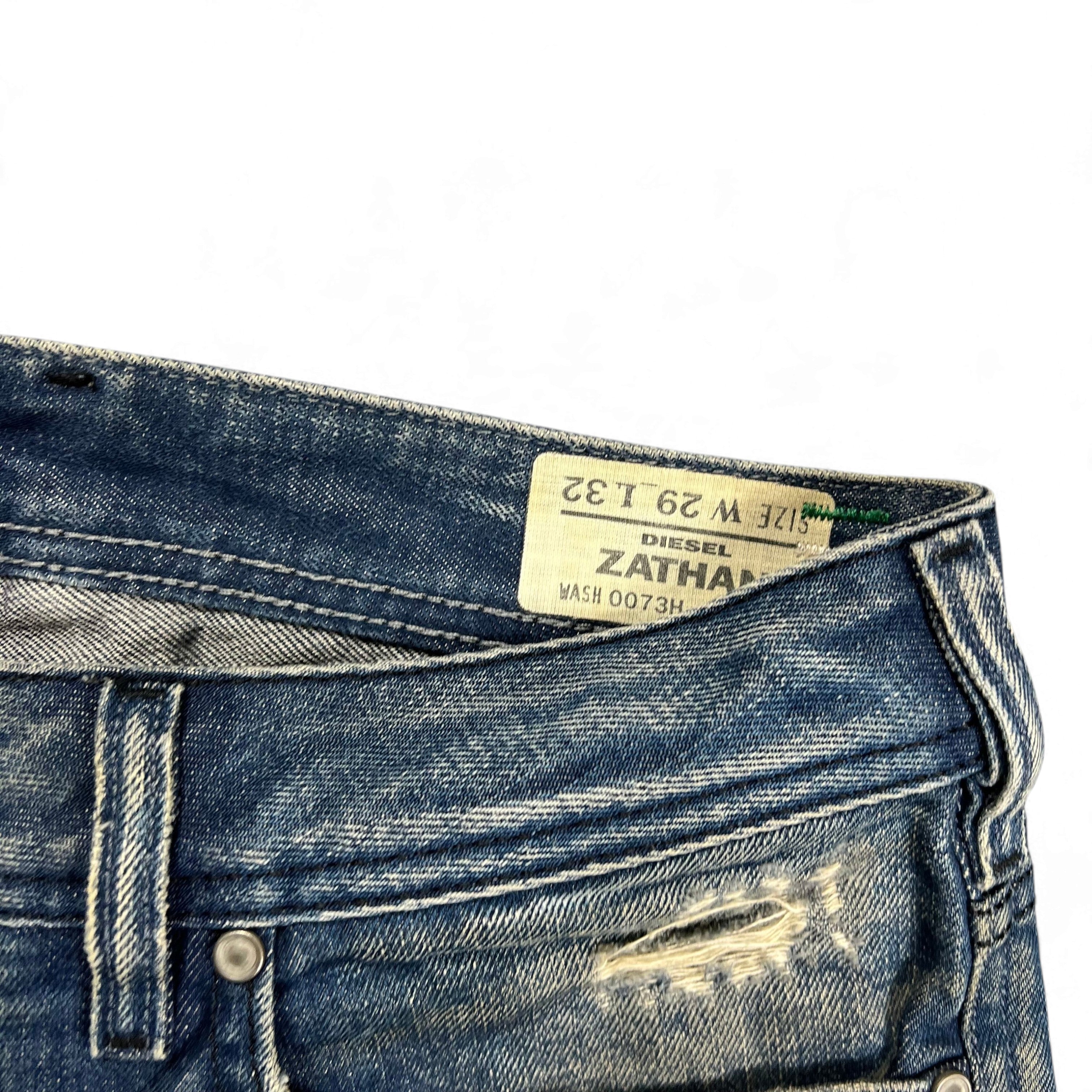 TWC Vintage Diesel Zathan Jeans mit Dirty-Waschung, geradem Bein und Distressed-Details am Bund