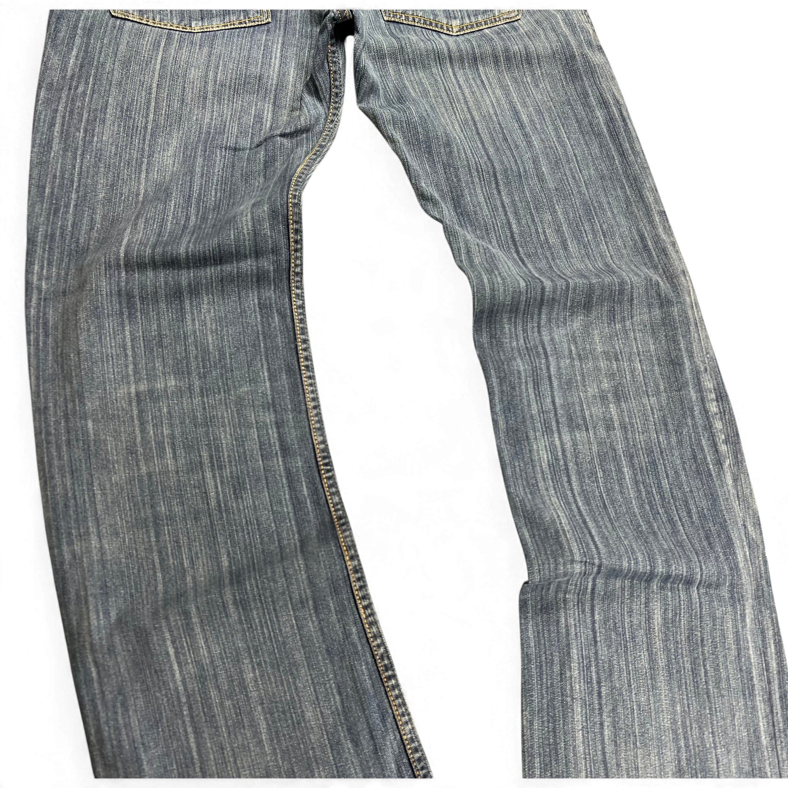 TWC Vintage Diesel Zatiny Bootcut Jeans in verwaschenem Blau mit markanter vertikaler Waschung und Kontrastnähten