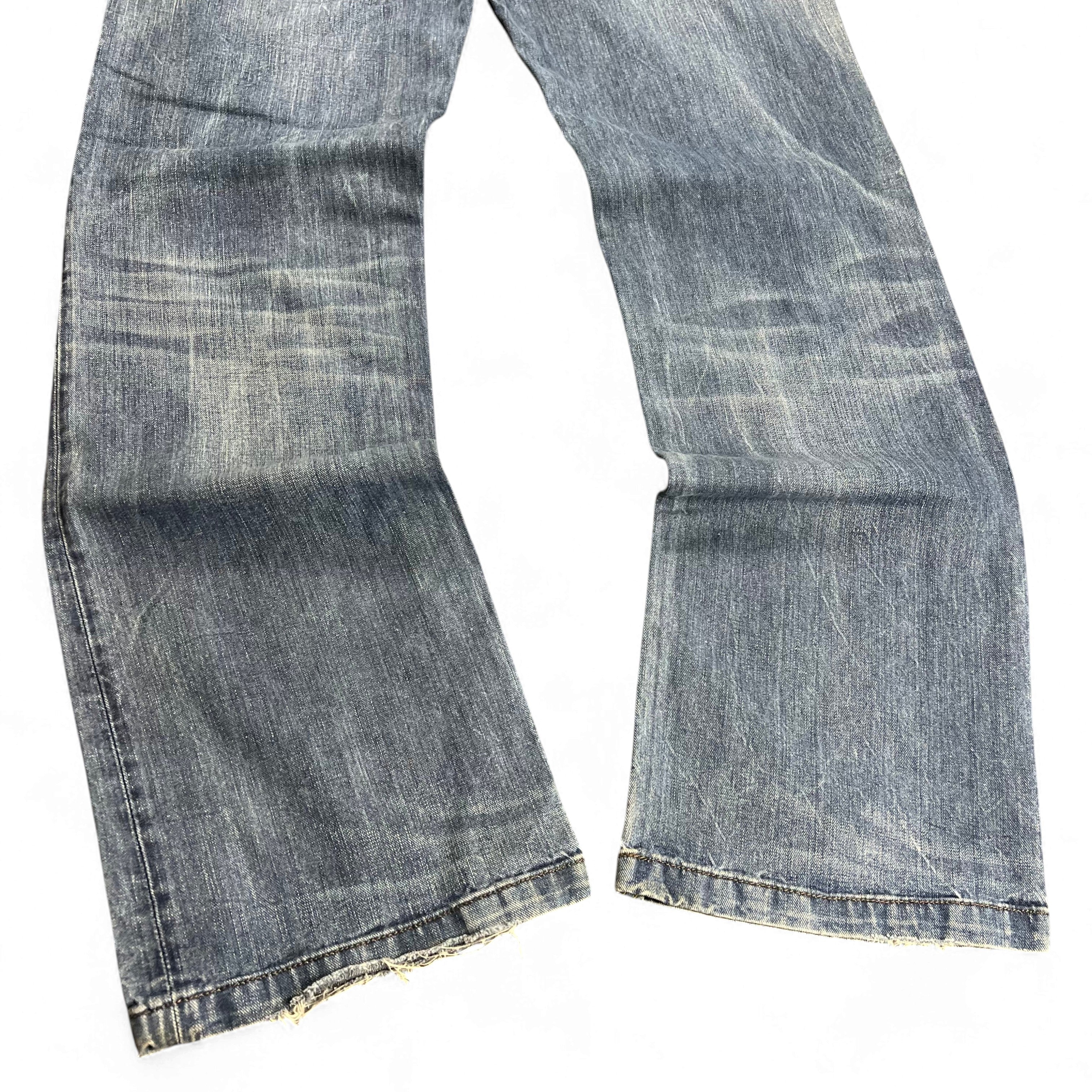 TWC Vintage Diesel Lemmen Straight Jeans in verwaschenem Blau mit geradem Bein und leicht abgenutzten Säumen