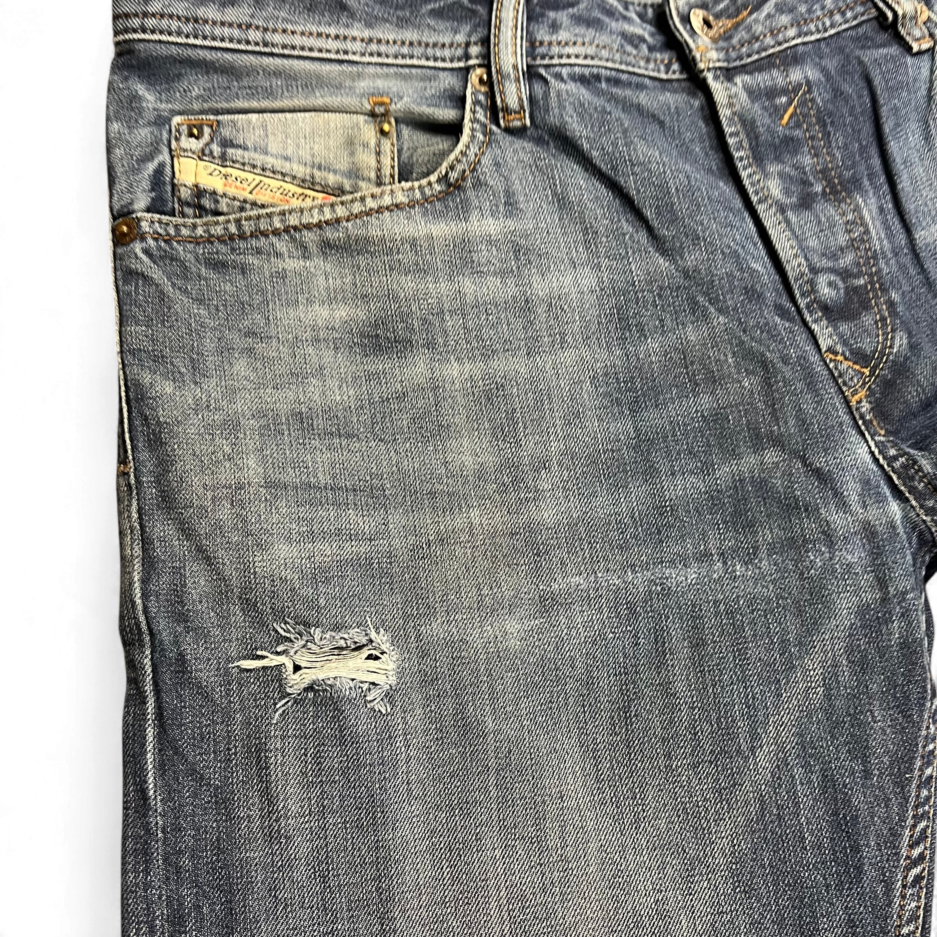 TWC Vintage Diesel Waykee Jeans in verwaschenem Blau mit Distressed-Details und charakteristischer Münztasche