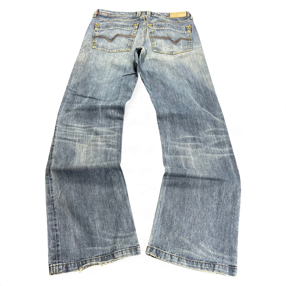 TWC Vintage Diesel Lemmen Straight Jeans in verwaschenem Blau mit geradem Bein und ausgefransten Säumen