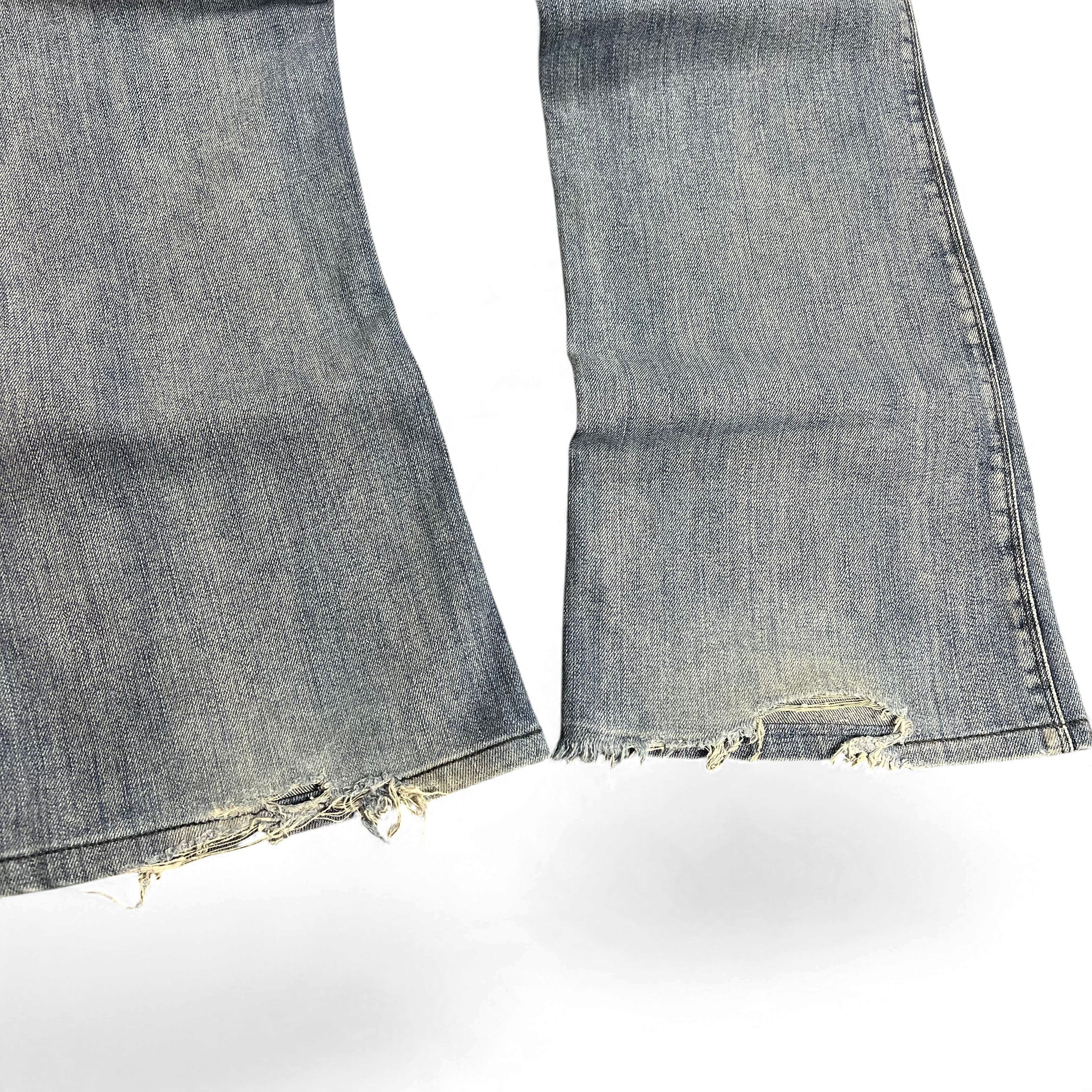 TWC Vintage Diesel Zaf Bootcut Jeans in verwaschenem Blau mit ausgefransten Säumen und Vintage-Details