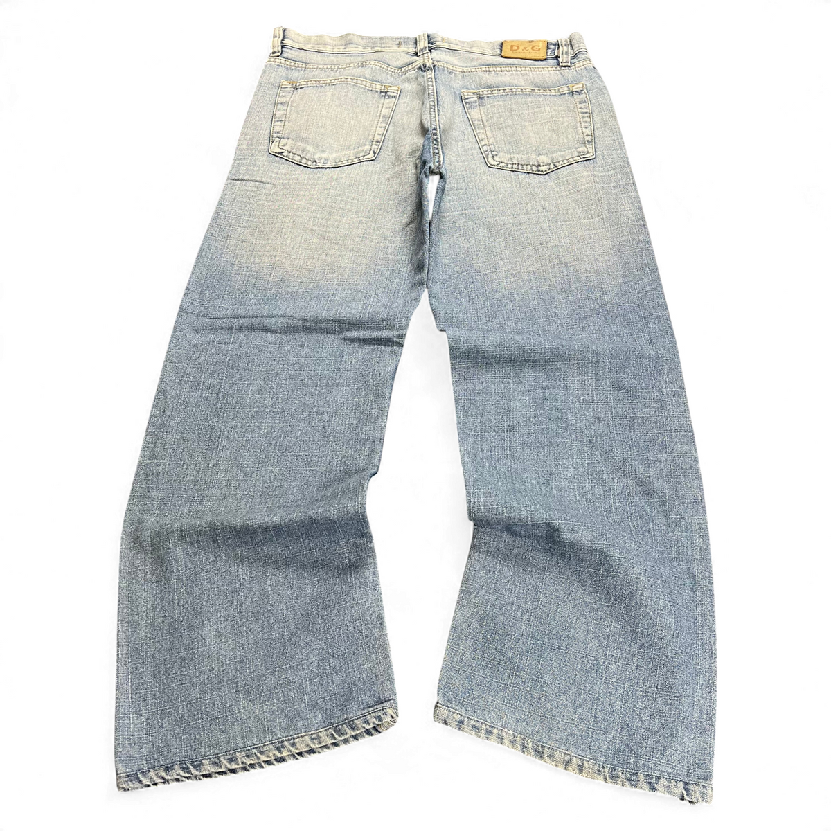 TWC Vintage Dolce&Gabbana Baggy Jeans in hellblauem Denim mit weitem Bein und Leder-Label auf der Rückseite