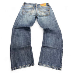 TWC Vintage Diesel Larkee Straight Jeans in verwaschenem Blau mit klassischem Five-Pocket-Design und Leder-Patch