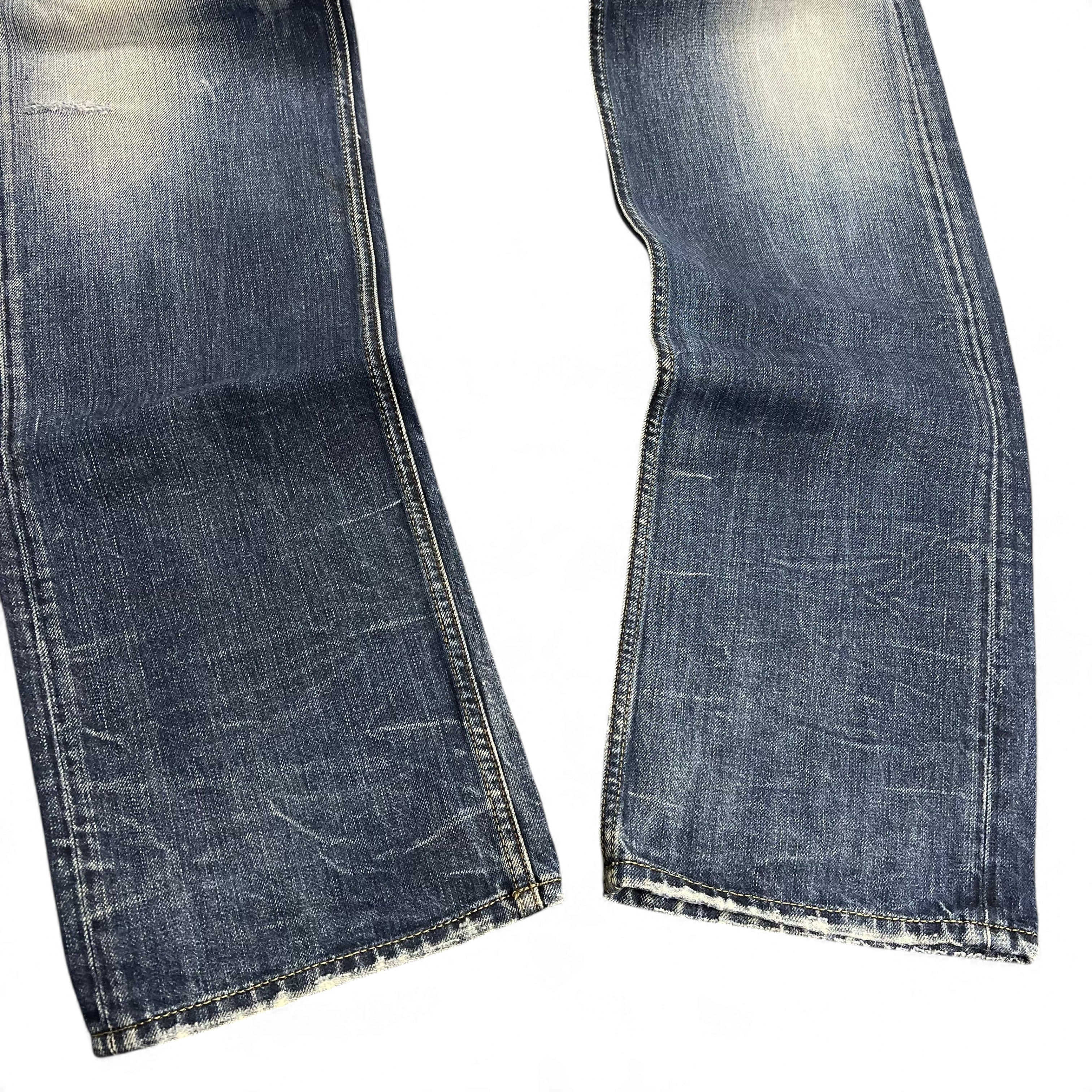 TWC Vintage Diesel Larkee Straight Jeans mit verwaschener blauer Denim-Optik und abgenutzten Säumen
