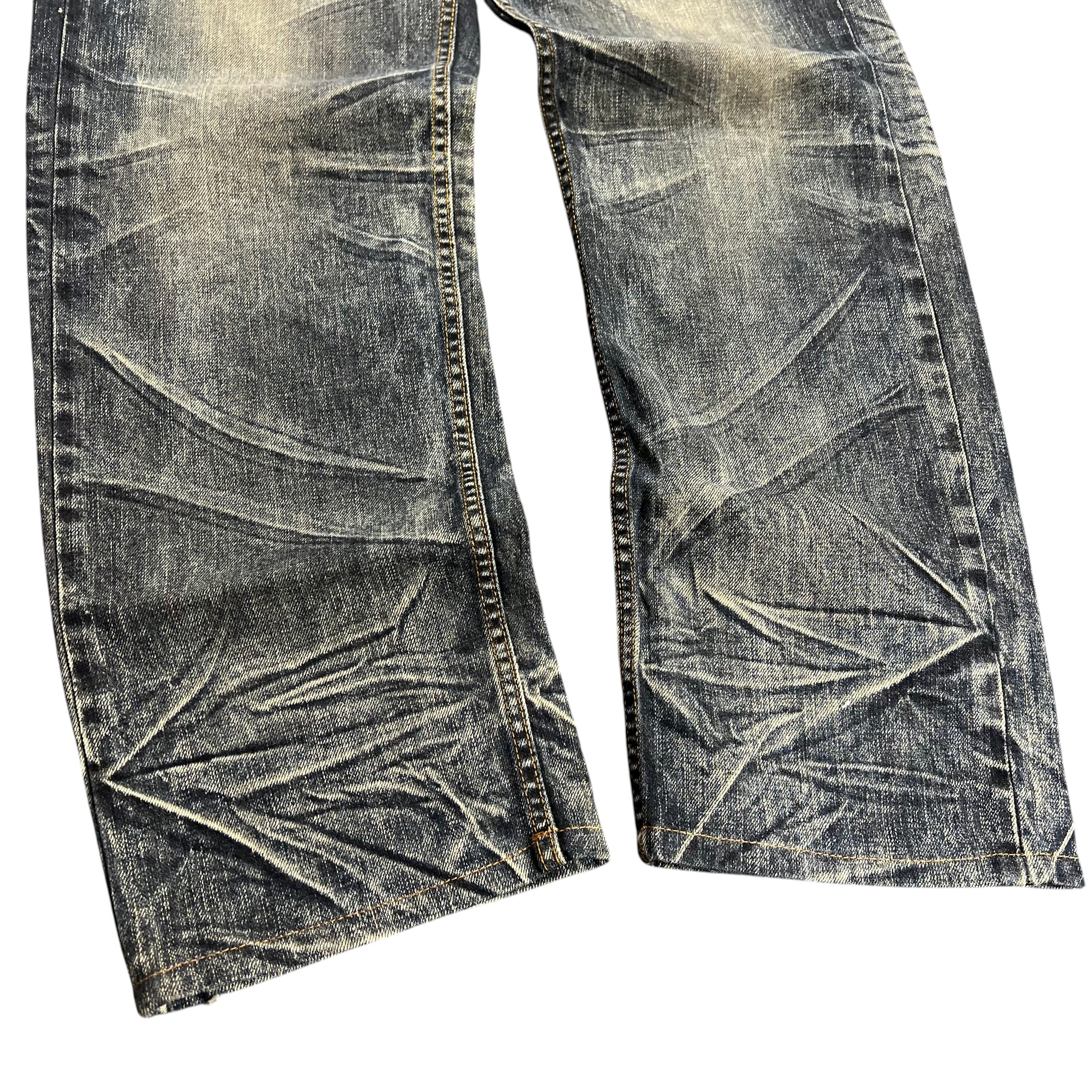 TWC Vintage Japanese Big Train Jeans mit markanter Waschung und Faltenwurf in Dunkelblau