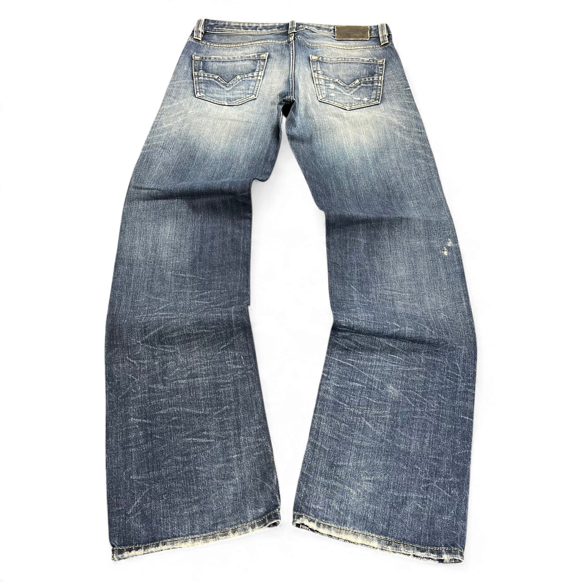 TWC Vintage Diesel Larkee Straight Jeans in verwaschenem Blau mit Used-Look und Gesäßtaschen