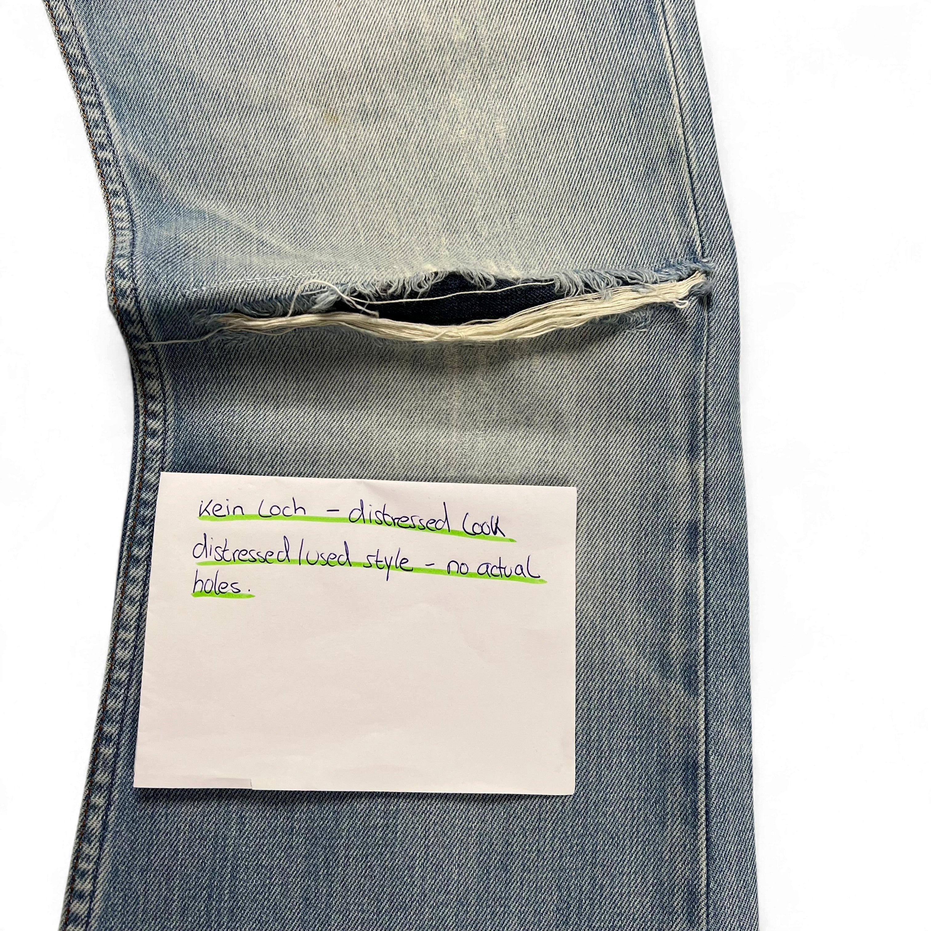 TWC Vintage Diesel Zatiny Bootcut Jeans in hellblauem Denim mit Distressed-Optik und ausgefranstem Kniebereich