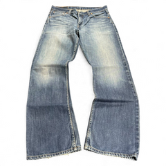 TWC Vintage Levi's 507 Bootcut Jeans in verwaschenem Blau mit ausgestelltem Bein und Vintage-Waschung