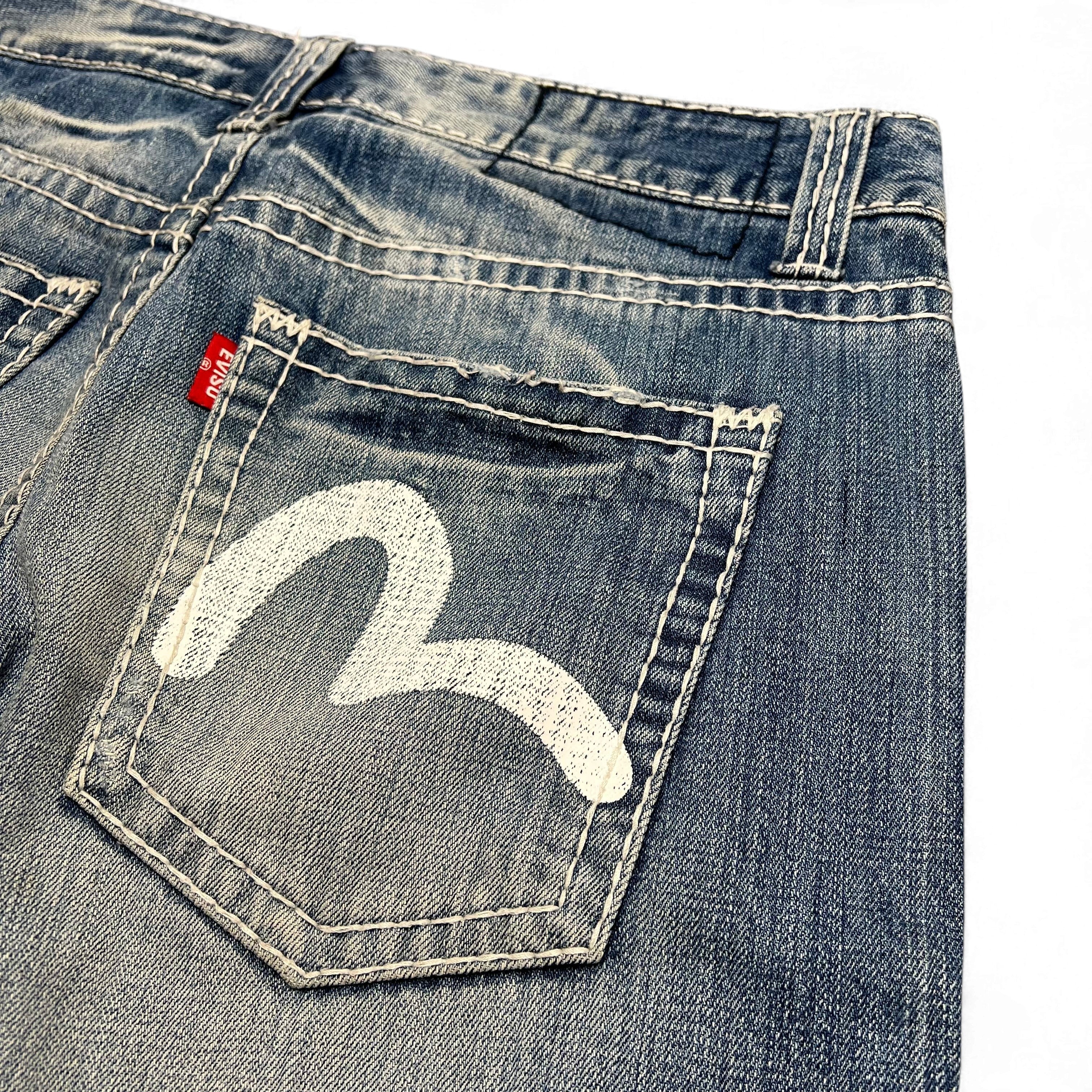 TWC Vintage Evisu KC Straight Jeans in verwaschenem Blau mit ikonischem weißem Seagull-Logo auf der Gesäßtasche