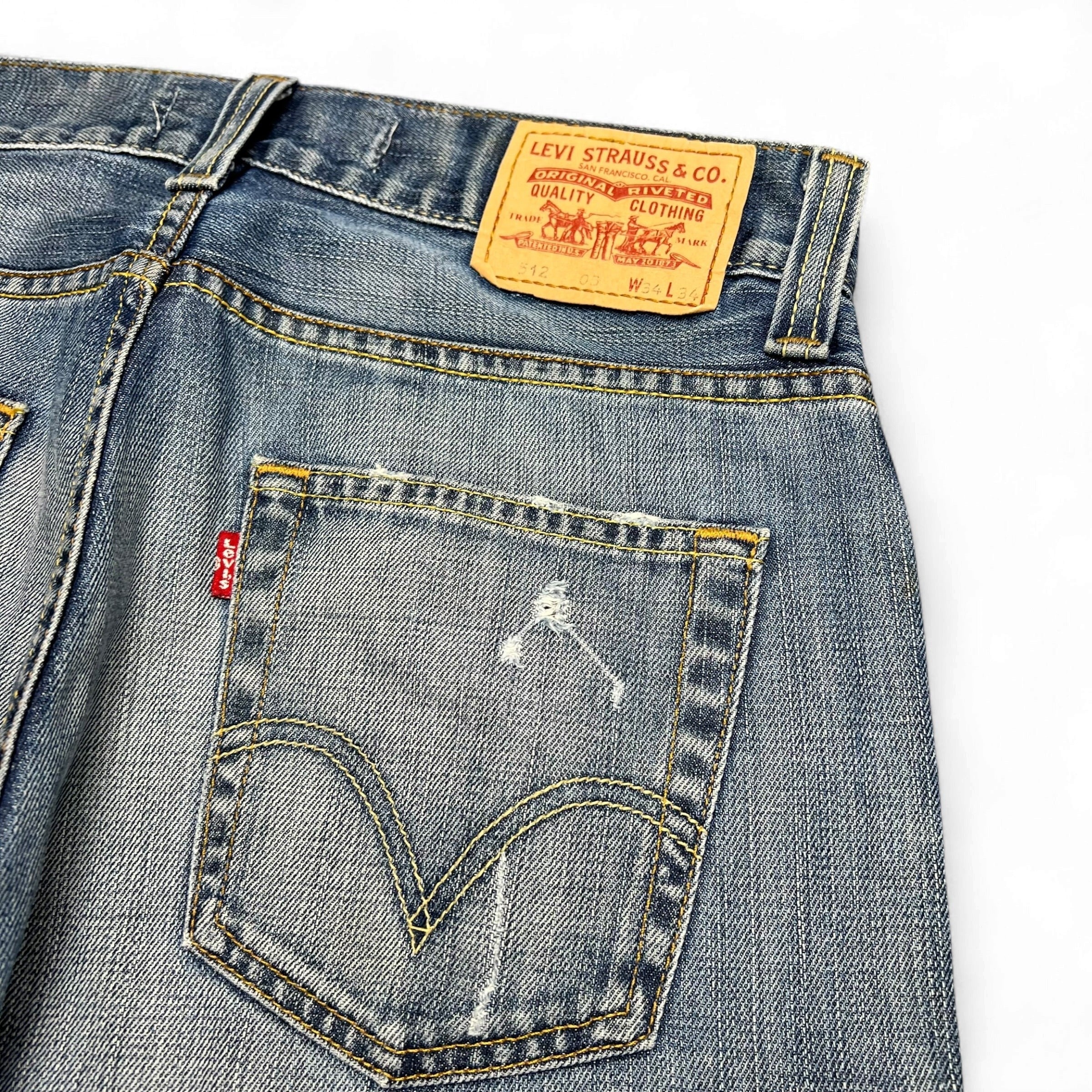 TWC Vintage Levi’s 512 Bootcut Jeans in blauem Denim mit Lederpatch und Gesäßtasche