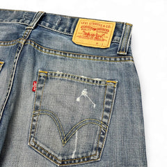 TWC Vintage Levi’s 512 Bootcut Jeans in blauem Denim mit Lederpatch und Gesäßtasche