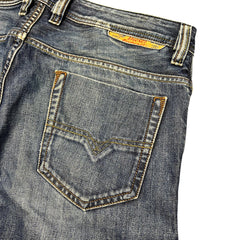 TWC Vintage Diesel Safado Straight Jeans in verwaschenem Blau mit markanten Kontrastnähten und Gesäßtaschen-Detail