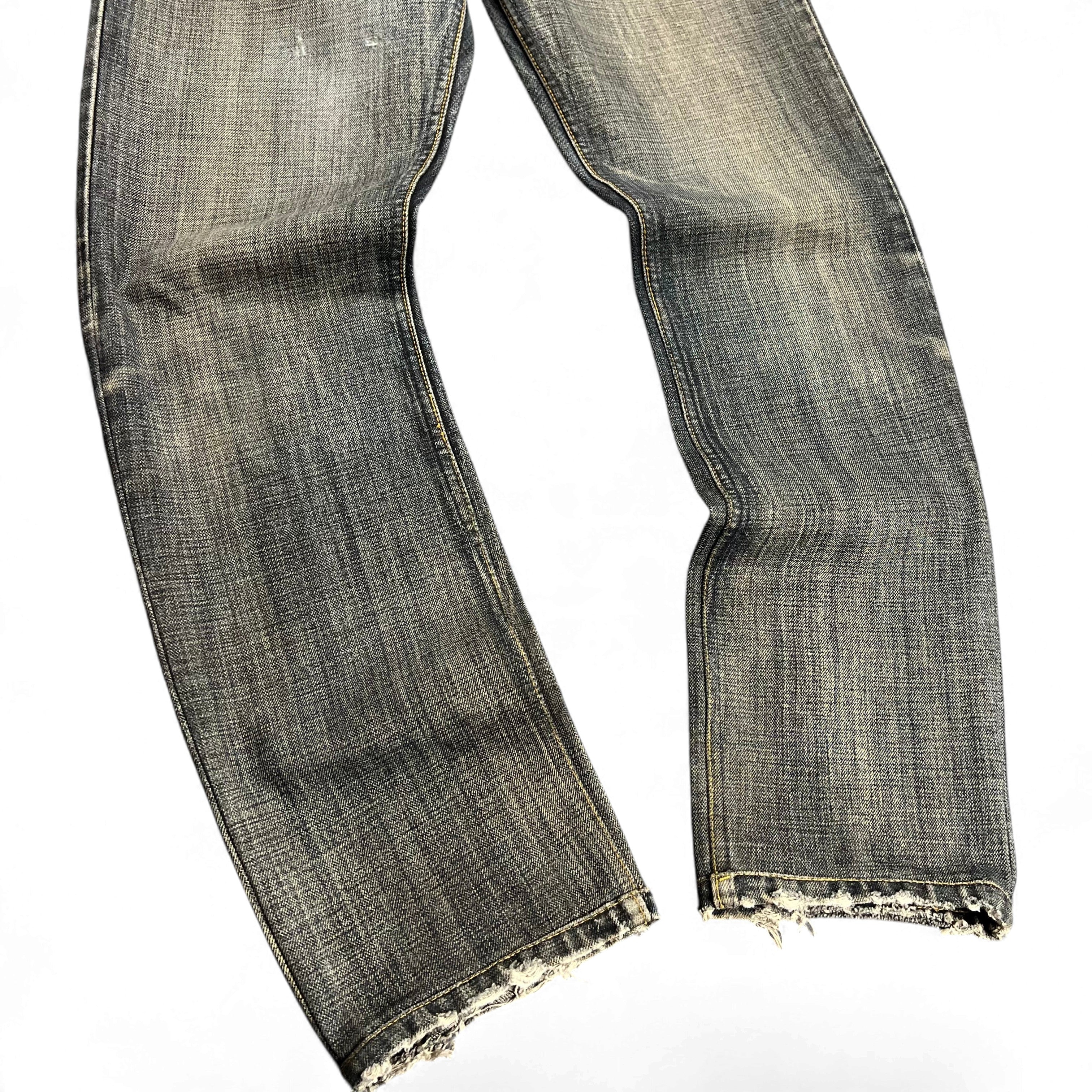 TWC Vintage Diesel Slim Jeans in verwaschenem Blau mit Distressed-Details am Saum