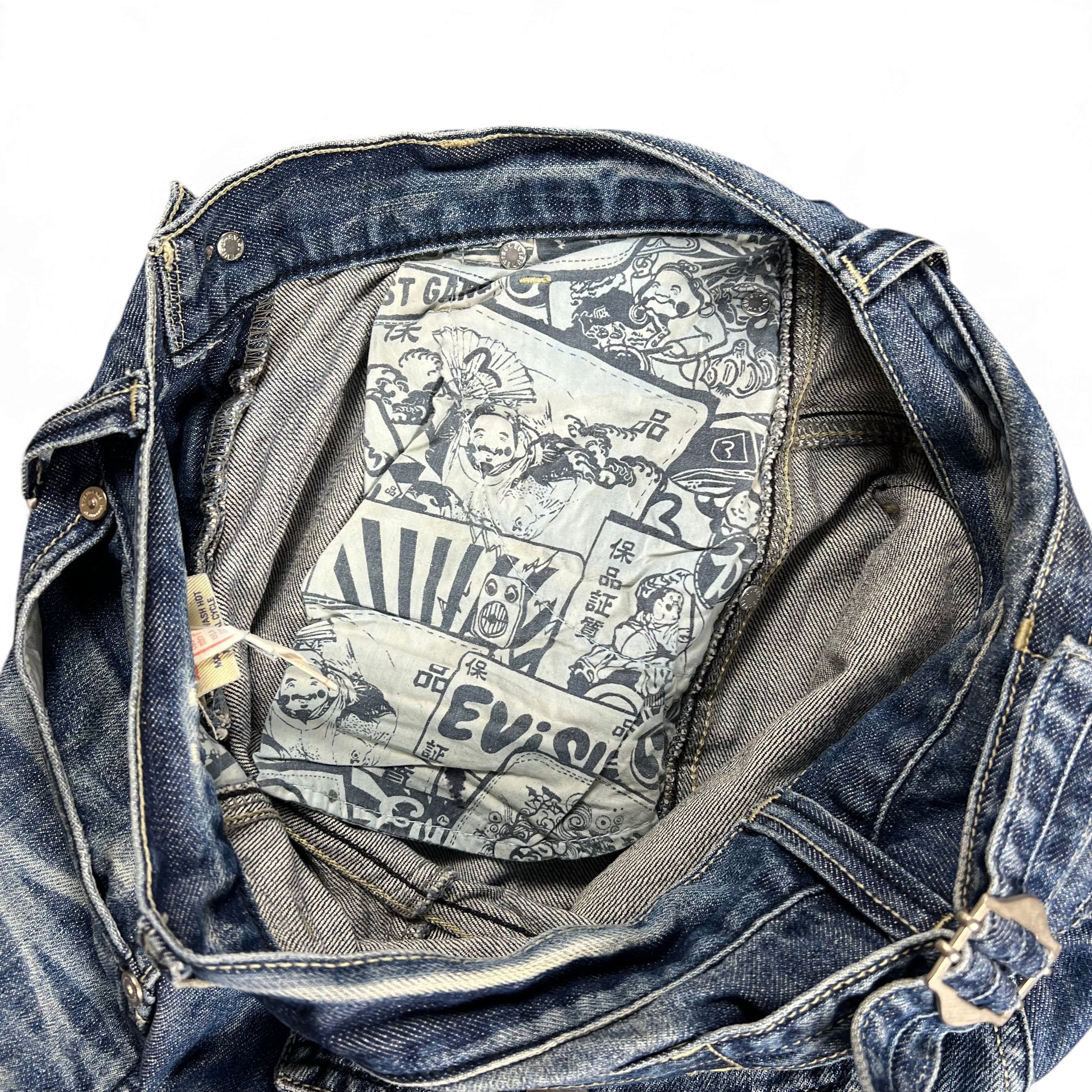 TWC Vintage Evisu KC Straight Jeans mit charakteristischem Comic-Print Innenfutter und klassischer blauer Waschung