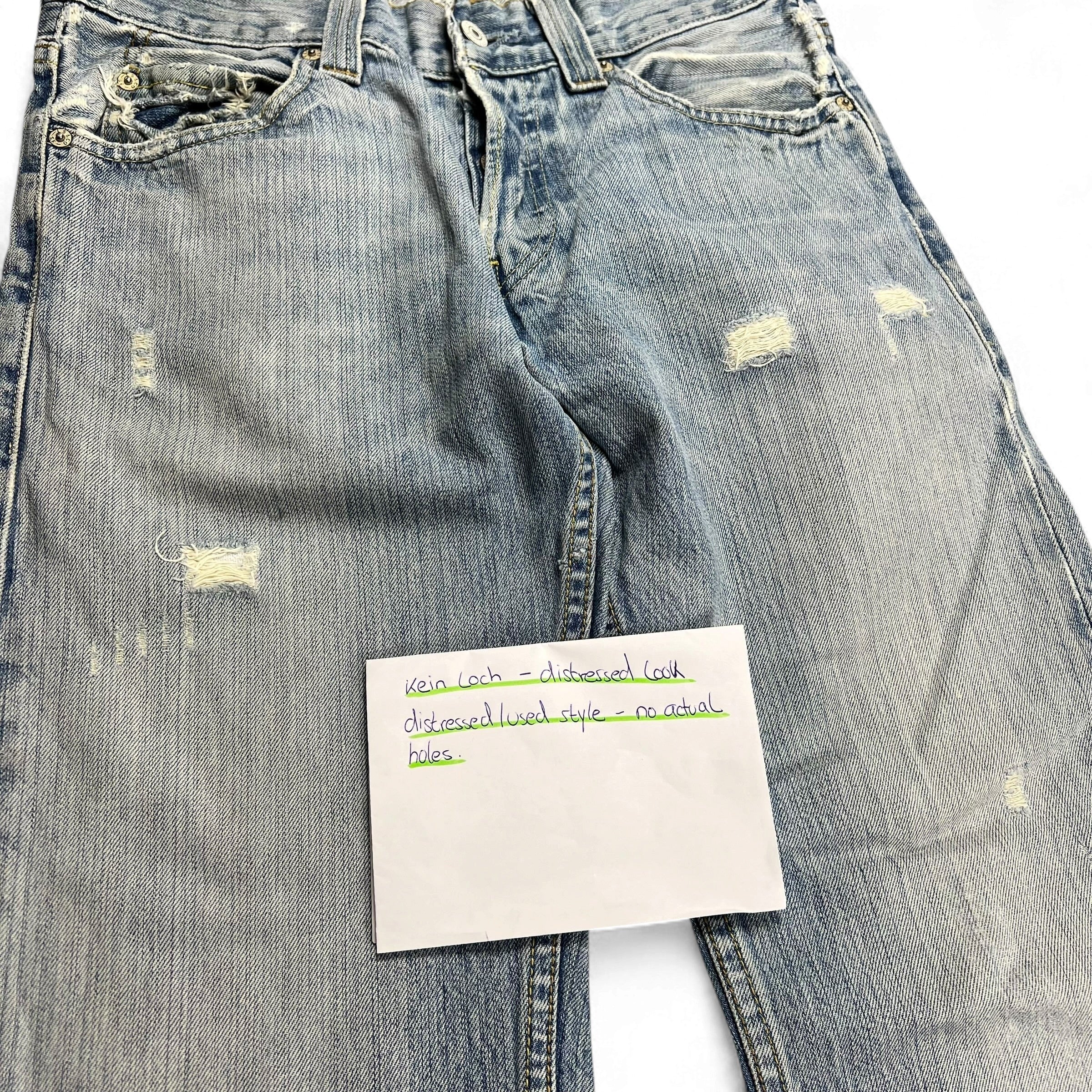 TWC Vintage Levi’s 512 Bootcut Jeans in hellblauem Denim mit Distressed-Optik und Used-Effekten