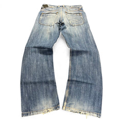 TWC Vintage Diesel Busky Straight Jeans in blauem Denim mit Used-Look und ausgefransten Beinabschlüssen