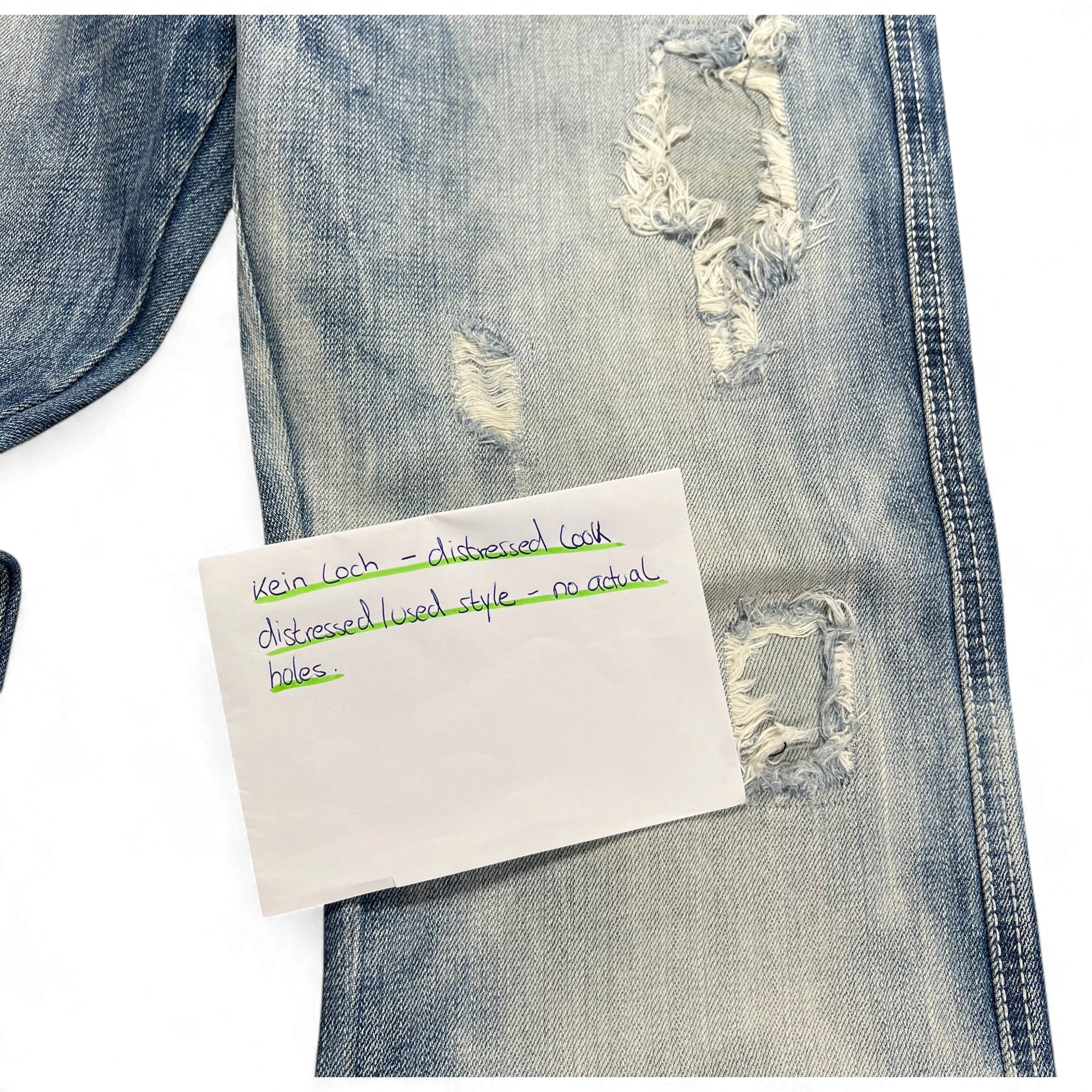 TWC Vintage Evisu KC Baggy Jeans in hellblauem Denim mit Distressed-Optik und abgenutzten Details