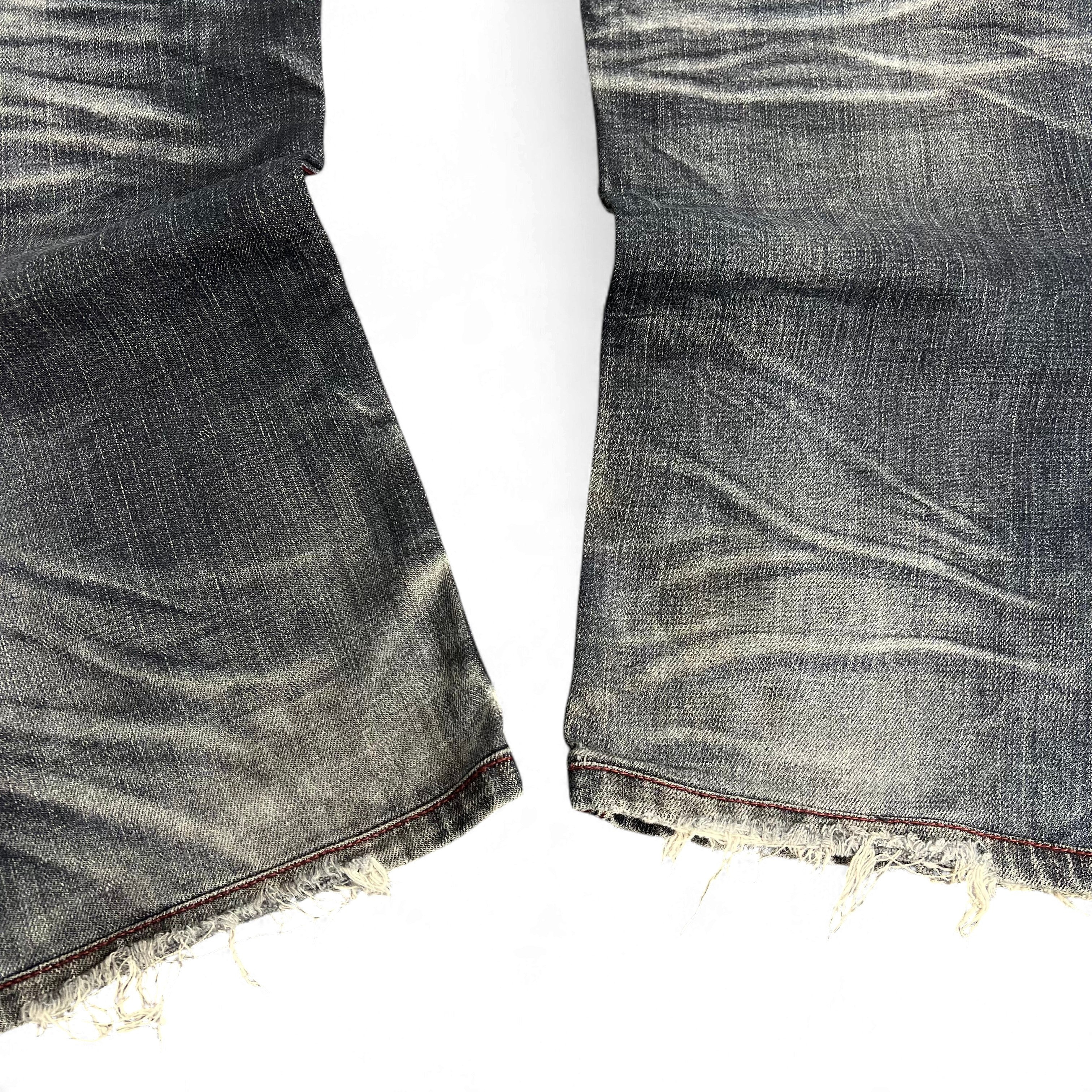 TWC Vintage Evisu Jeans mit geradem Schnitt, verwaschenem Denim-Look und ausgefransten Beinabschlüssen
