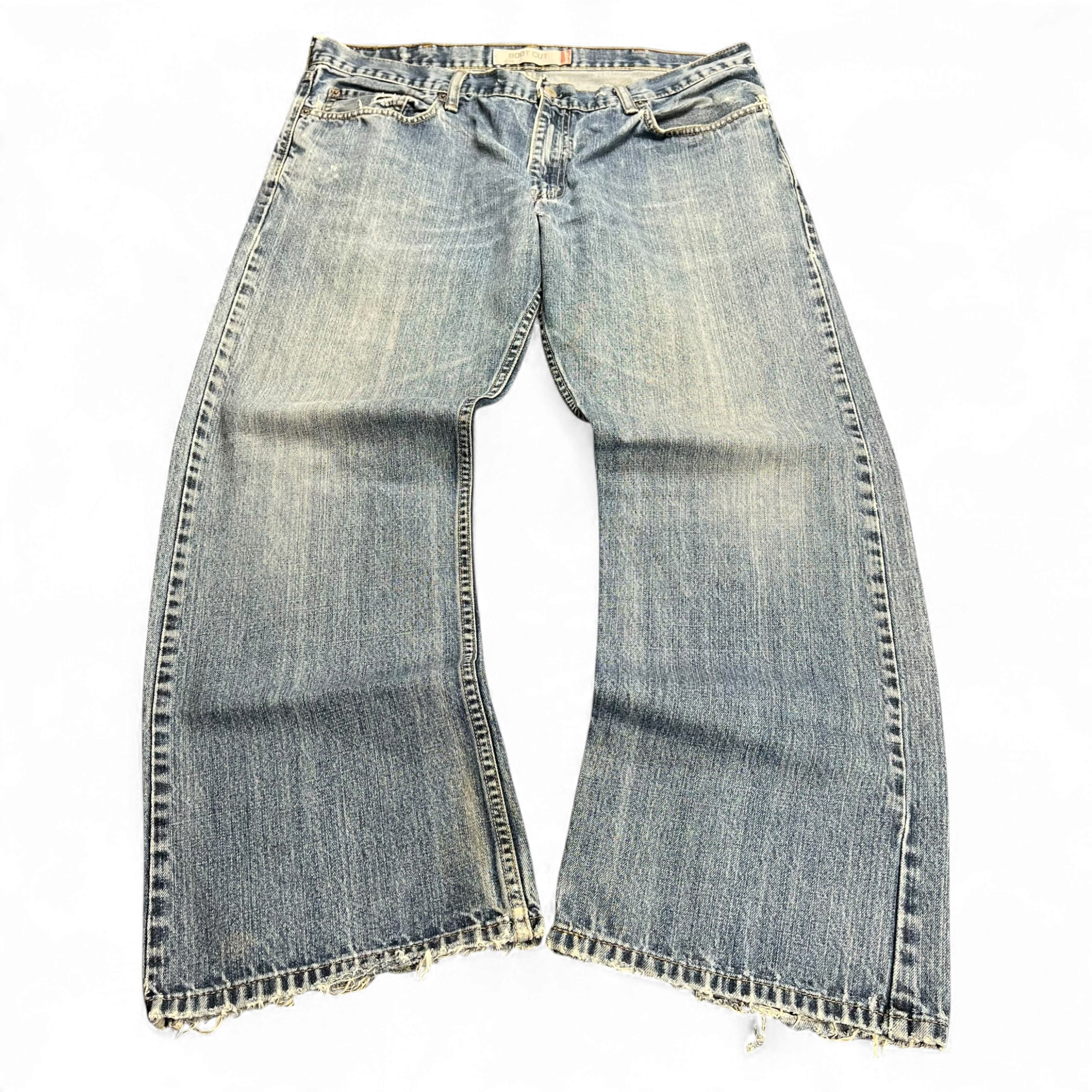 TWC Vintage Levi's 527 Loose Bootcut Jeans in verwaschenem Blau mit ausgefransten Beinabschlüssen