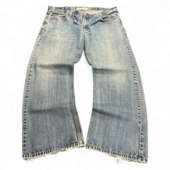 TWC Vintage Levi's 527 Loose Bootcut Jeans in verwaschenem Blau mit ausgefransten Beinabschlüssen