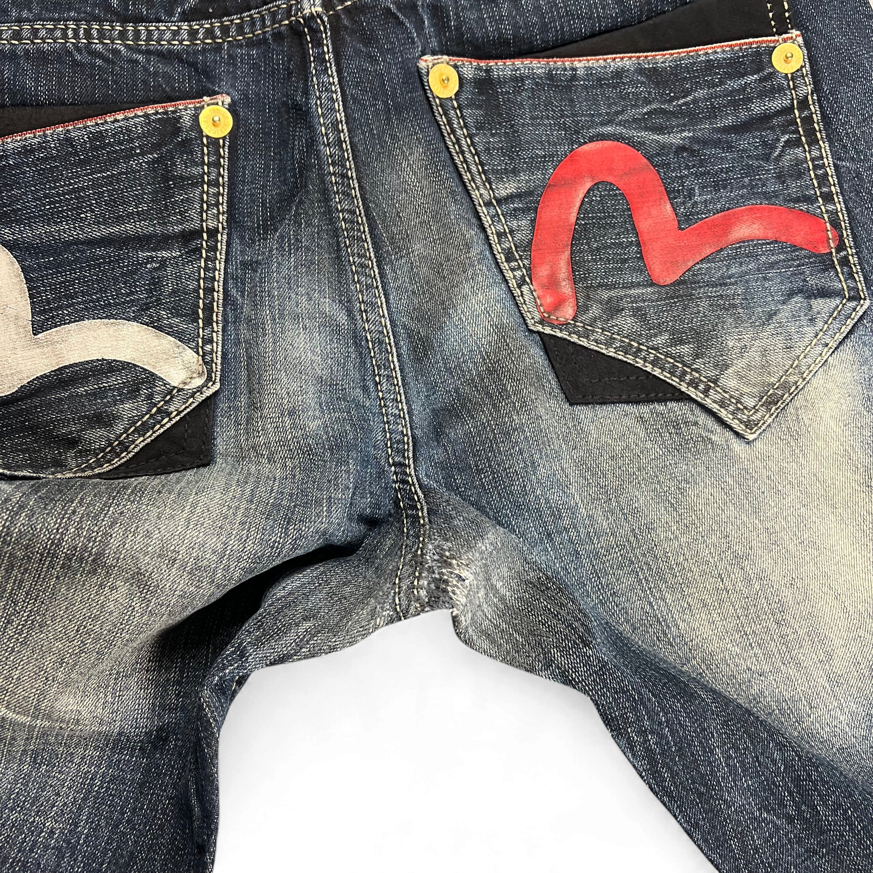 TWC Vintage Evisu KC Straight Jeans mit markanten roten und silbernen Seagull-Logos auf den Gesäßtaschen