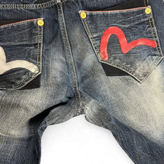 TWC Vintage Evisu KC Straight Jeans mit markanten roten und silbernen Seagull-Logos auf den Gesäßtaschen