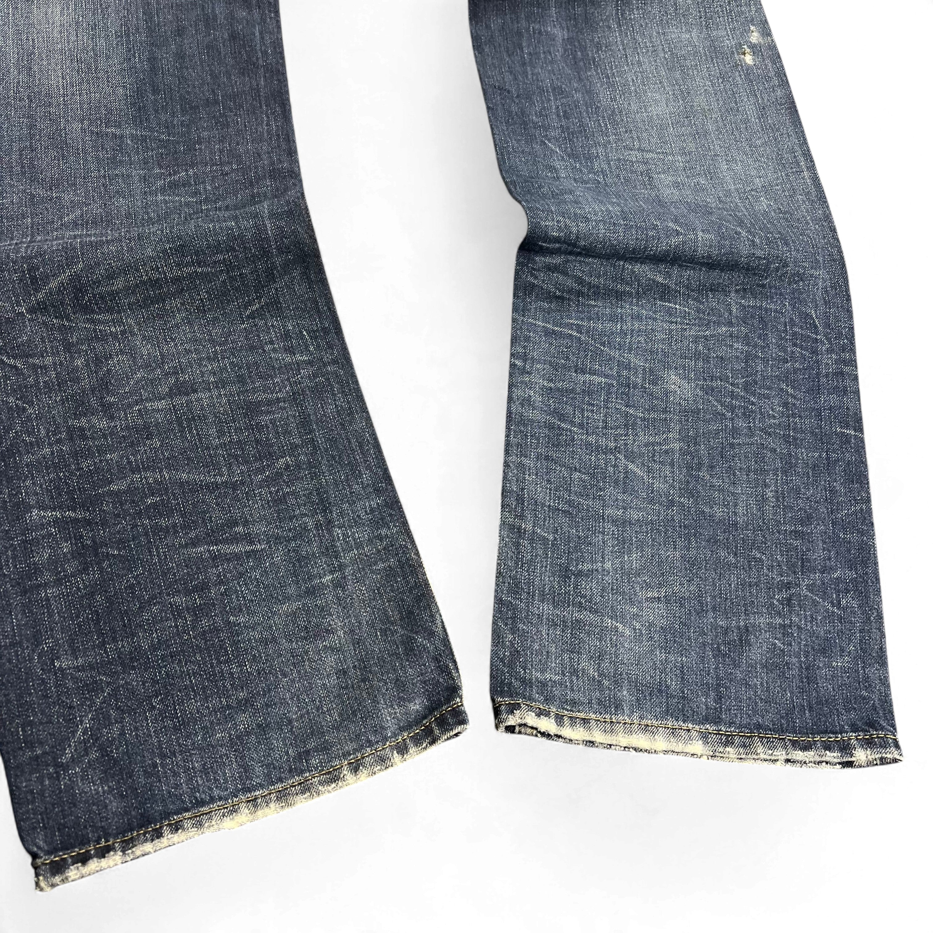 TWC Vintage Diesel Larkee Jeans mit geradem Bein in verwaschenem Blau mit Distressed-Details am Saum