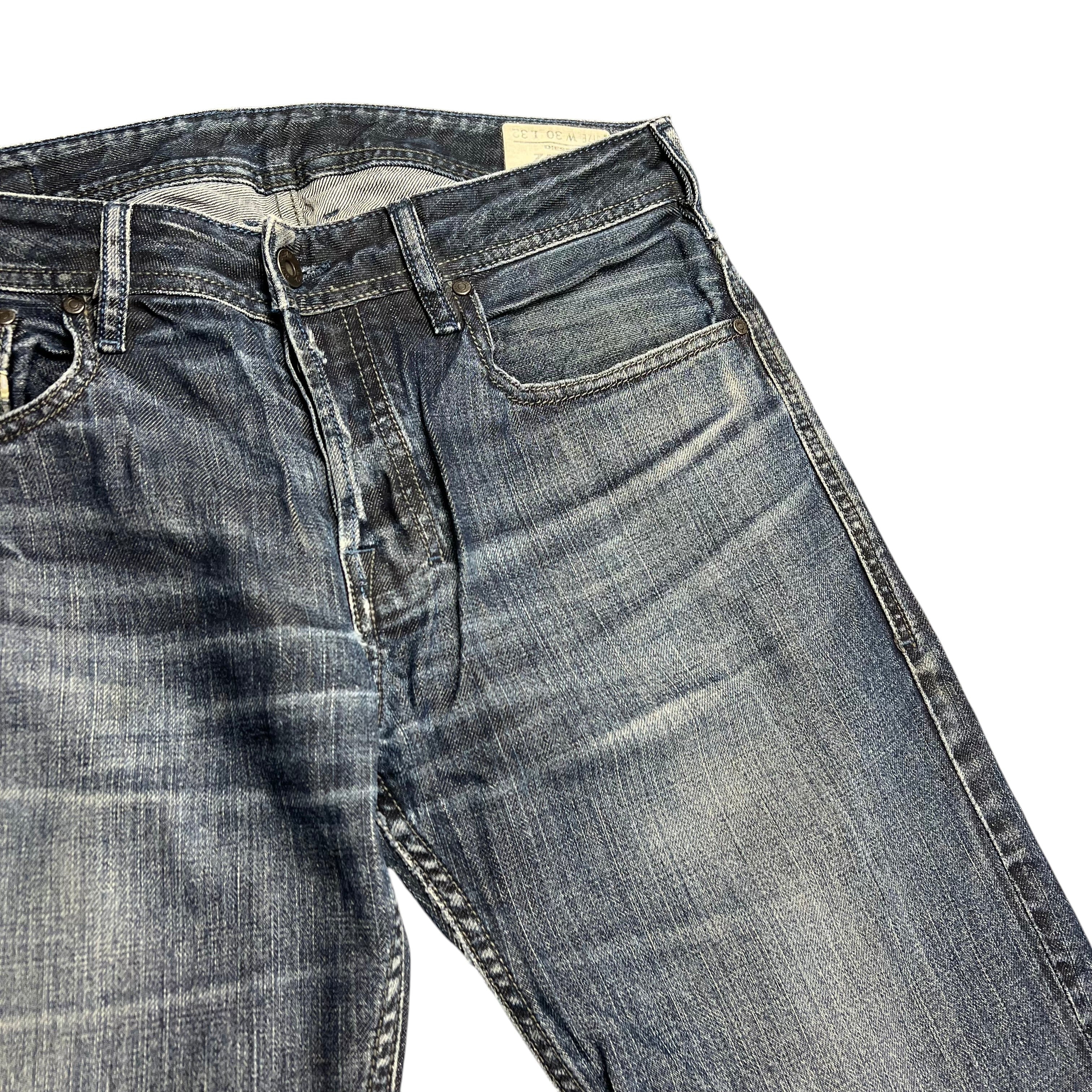 TWC Vintage Diesel Zatiny Bootcut Jeans in verwaschenem Blau mit klassischem Five-Pocket-Design und Used-Look