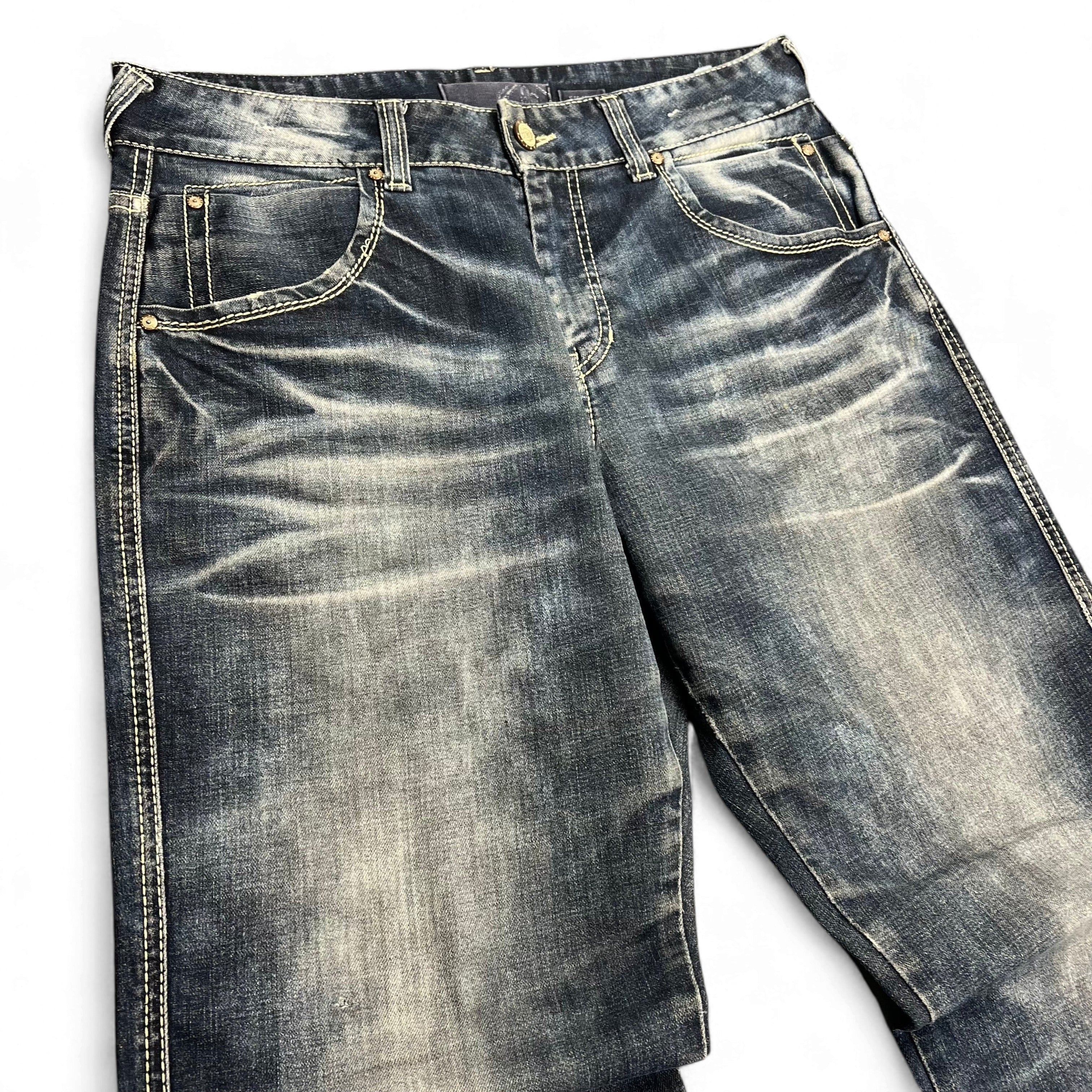 TWC Vintage Evisu KC Baggy Jeans in verwaschenem Blau mit markanten Whiskering-Details und Kontrastnähten